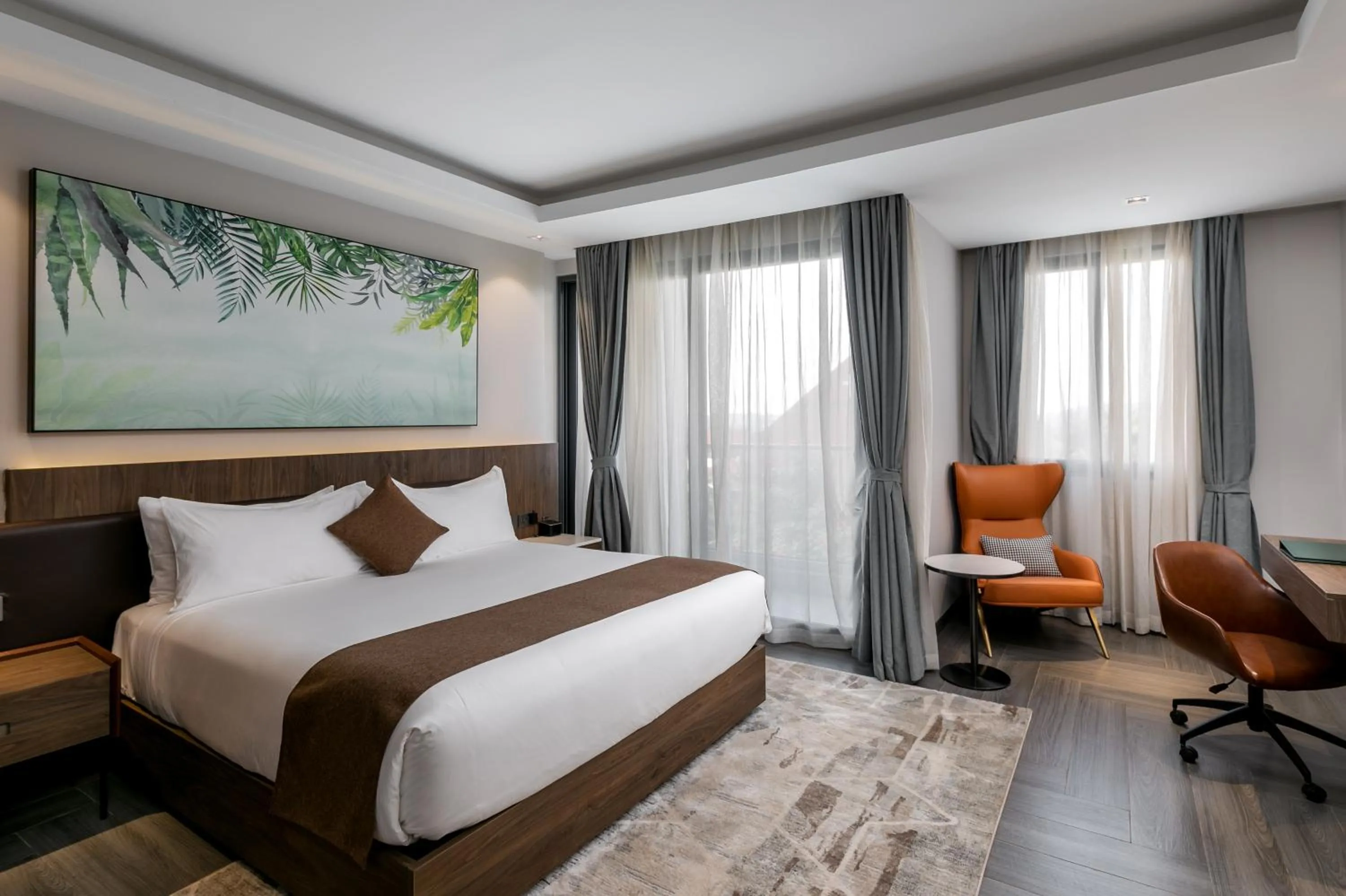 Bed in Zara Garden Hotel and Apartments