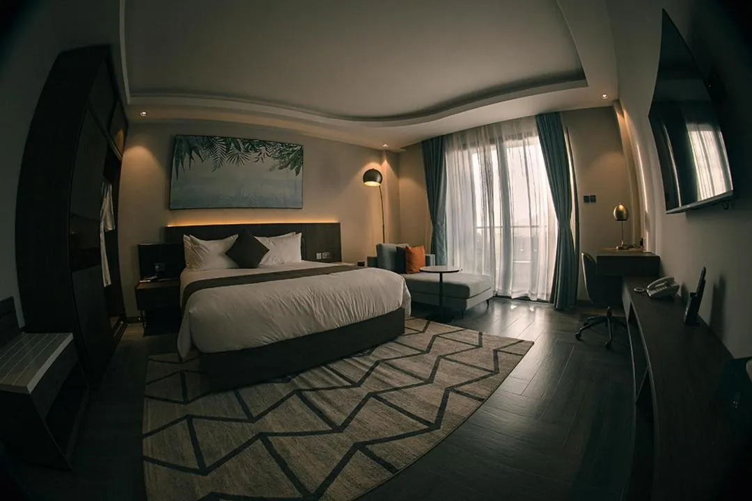 Bed in Zara Garden Hotel and Apartments