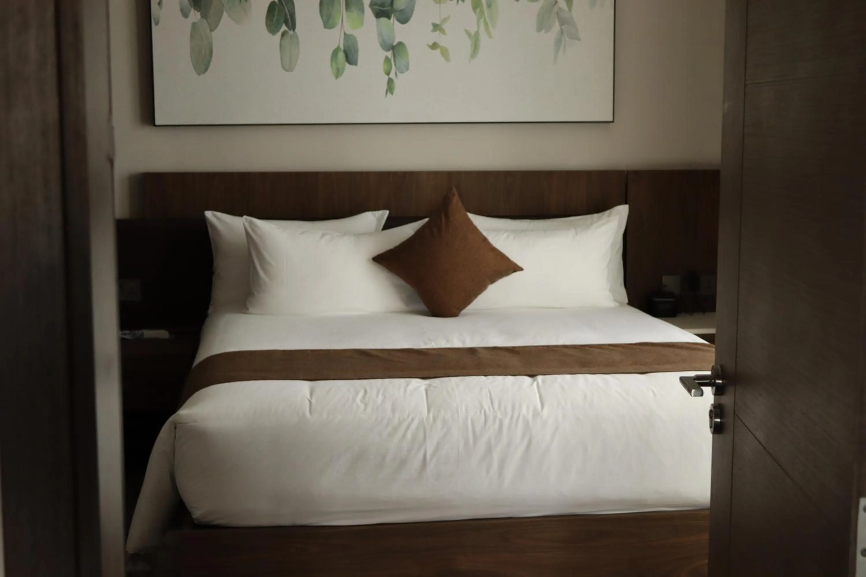 Bed in Zara Garden Hotel and Apartments