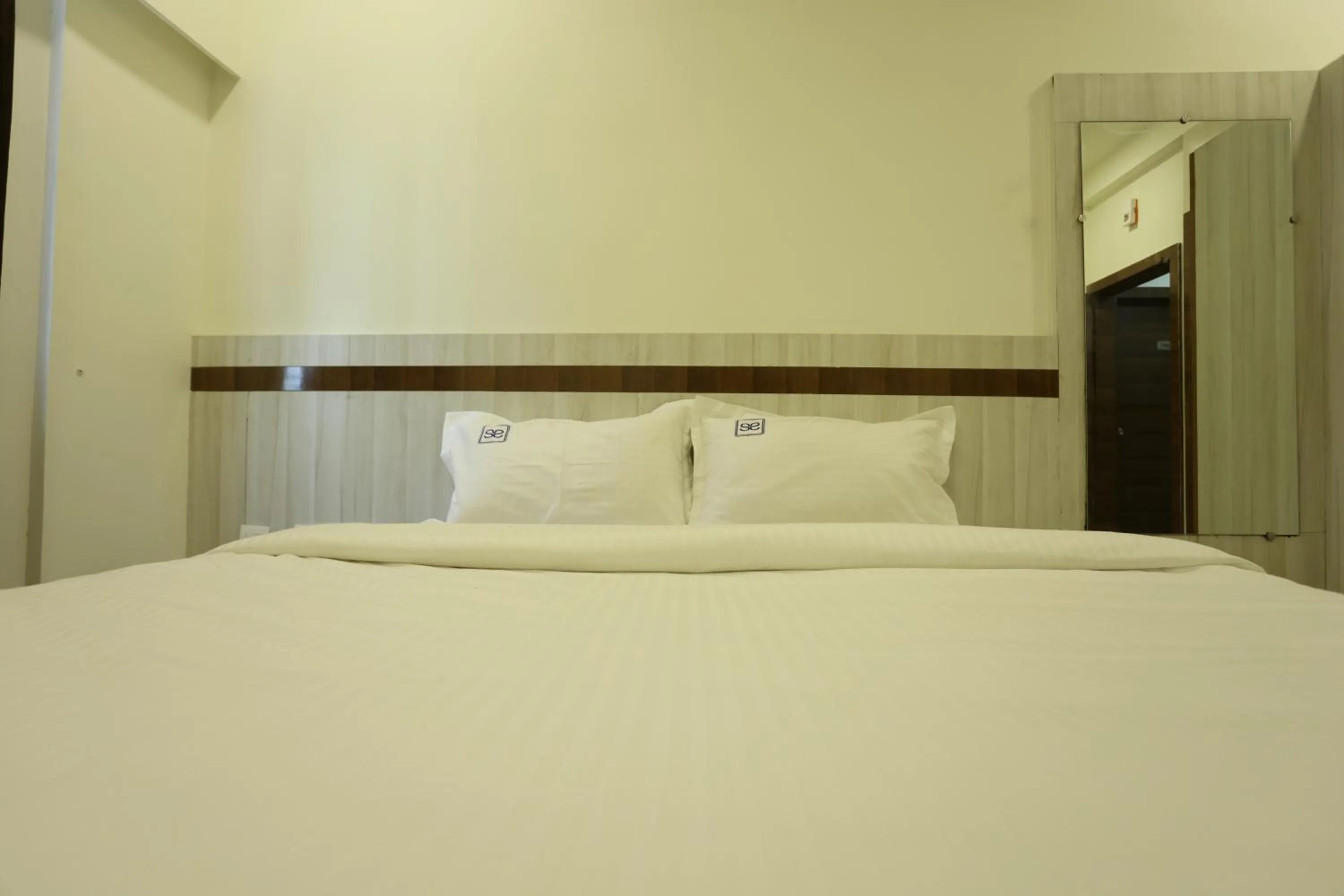 Bed in Hotel Sigma Suites