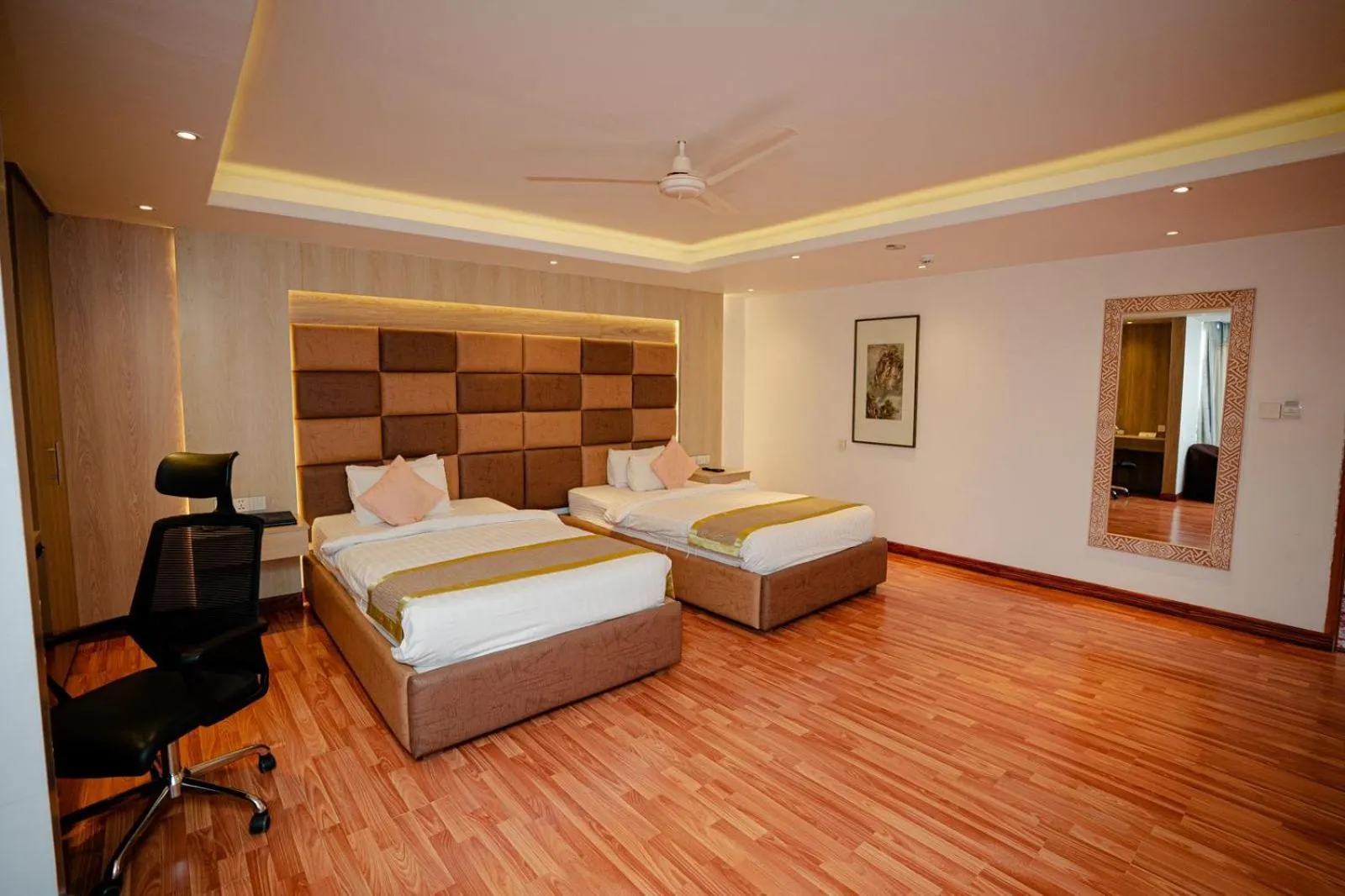 Bed in Royal Raj Hotel