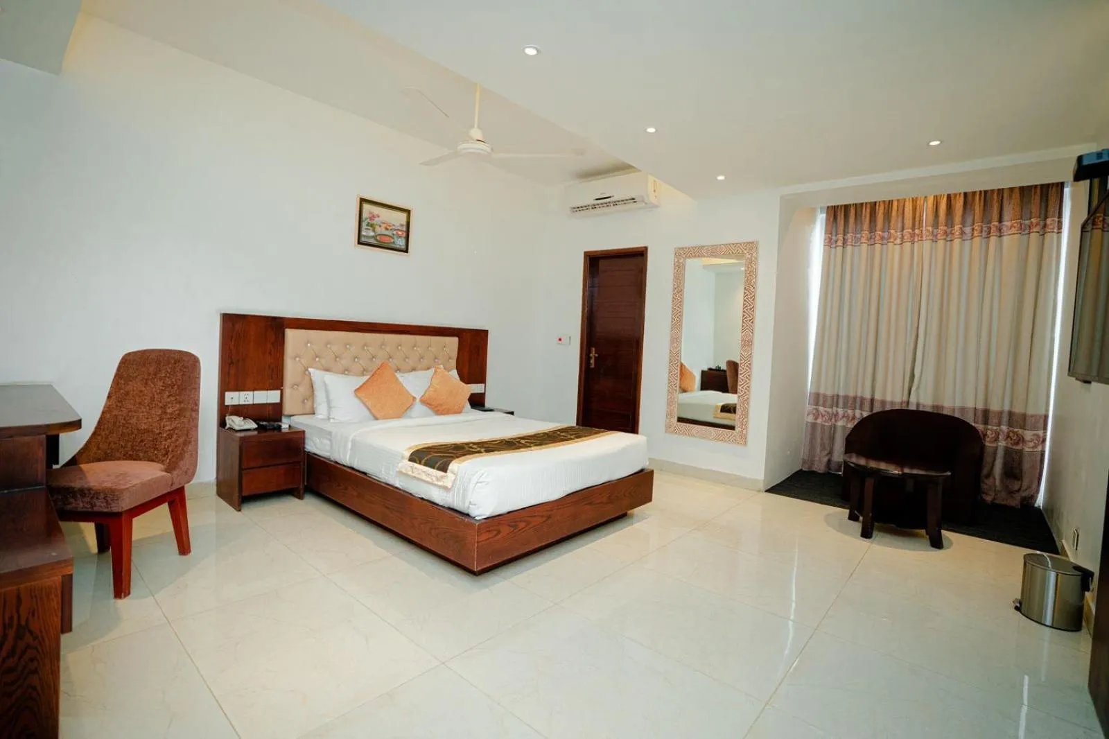 Bed in Royal Raj Hotel