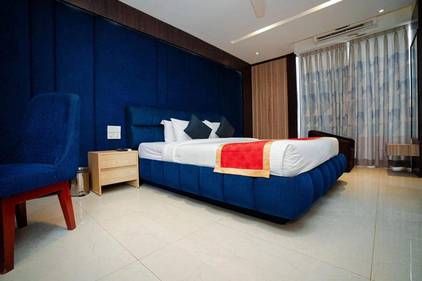 Bed in Royal Raj Hotel