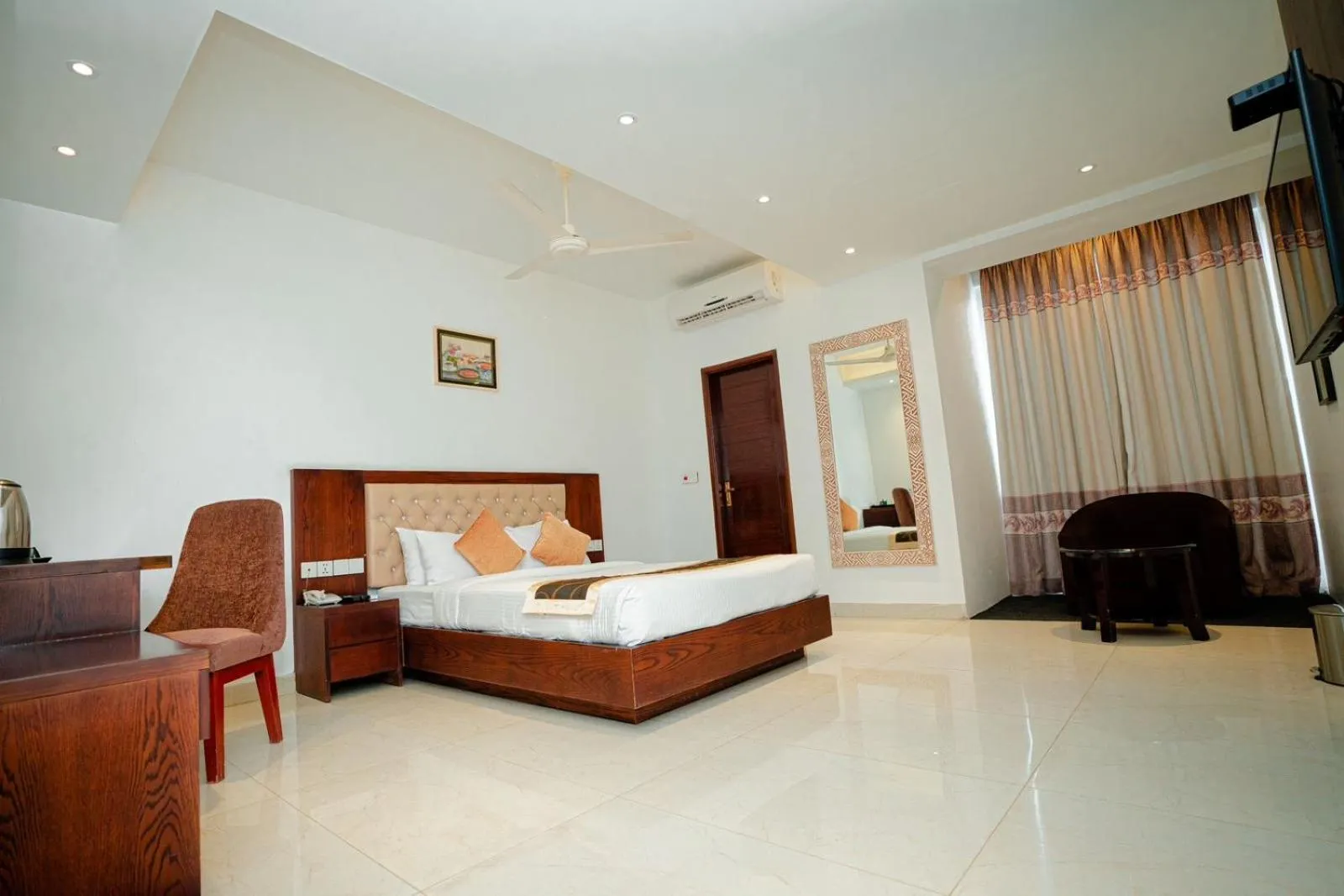 Bed in Royal Raj Hotel