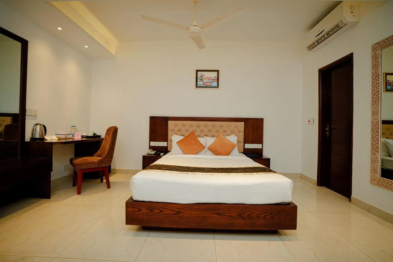 Bed in Royal Raj Hotel