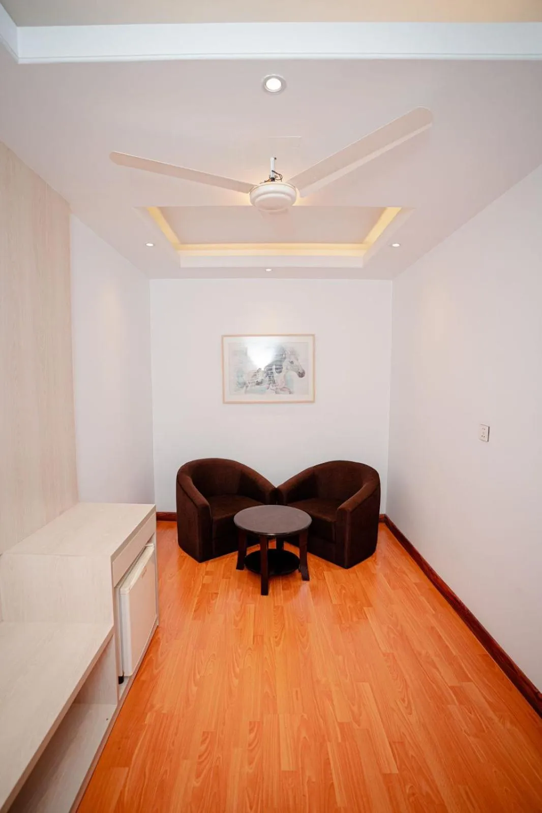 Seating area, Bed in Royal Raj Hotel