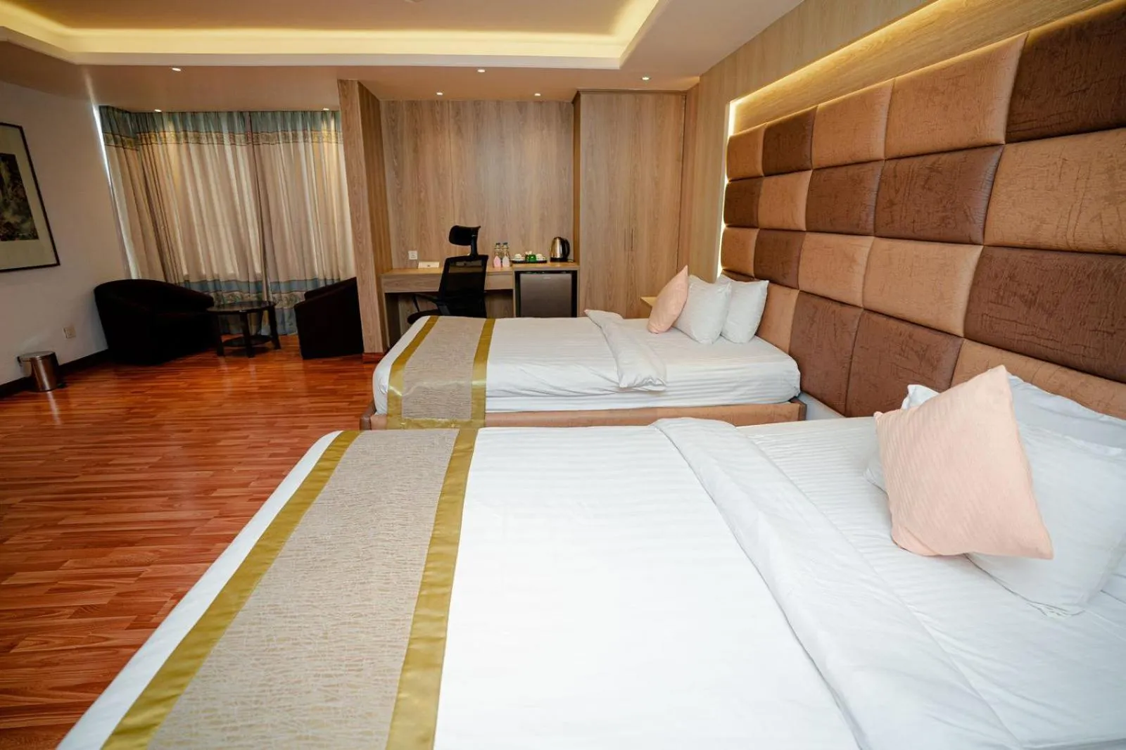 Bed in Royal Raj Hotel