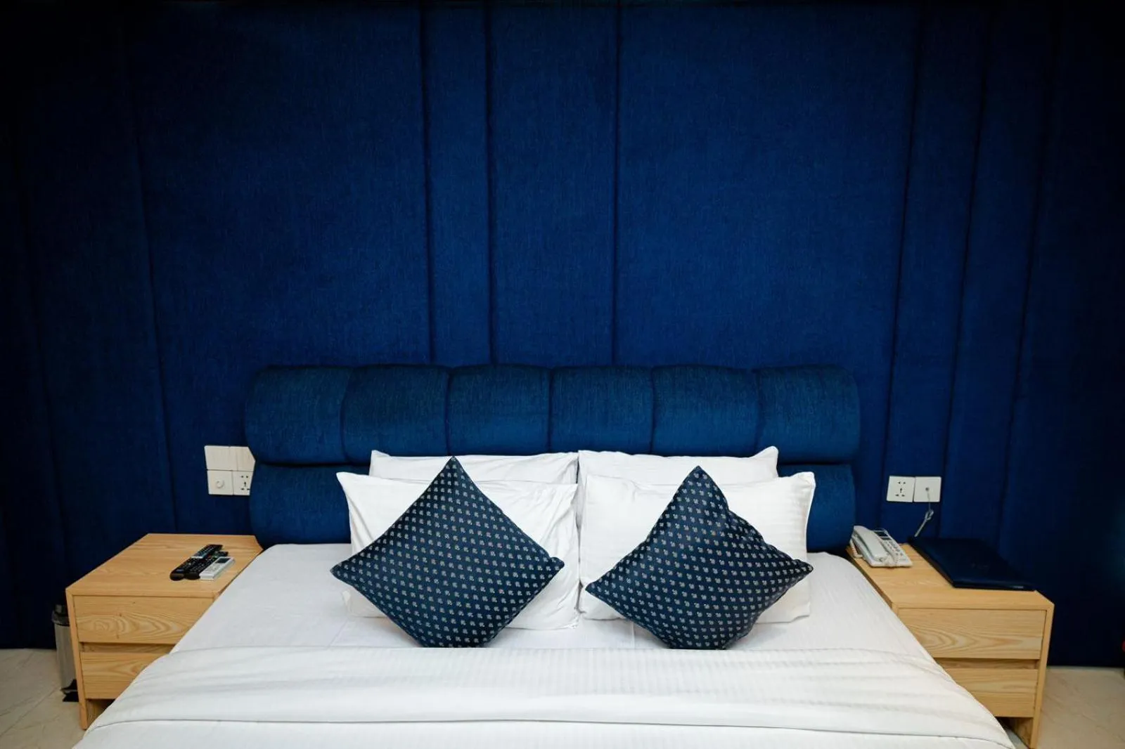 Bed in Royal Raj Hotel