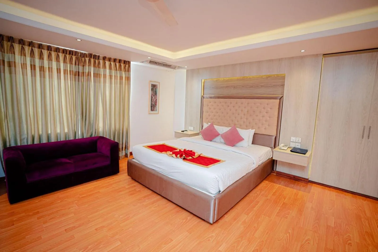 Bed in Royal Raj Hotel