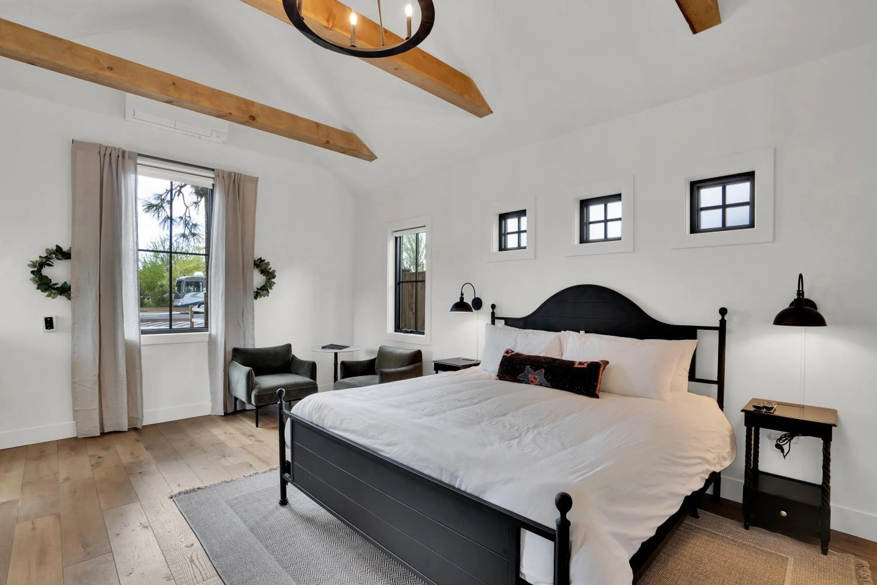 Bed in The Scout Boutique Cottages