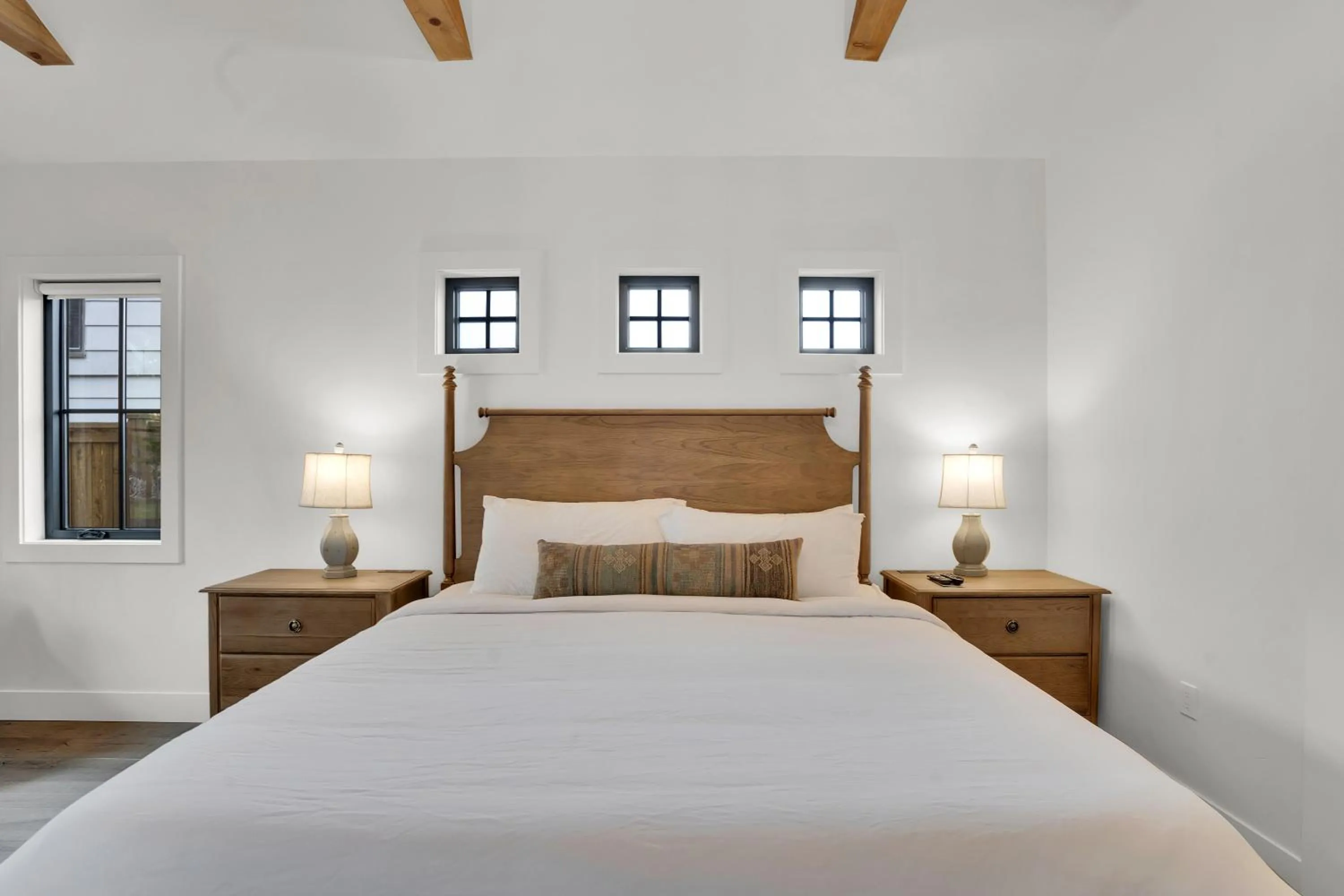 Bed in The Scout Boutique Cottages