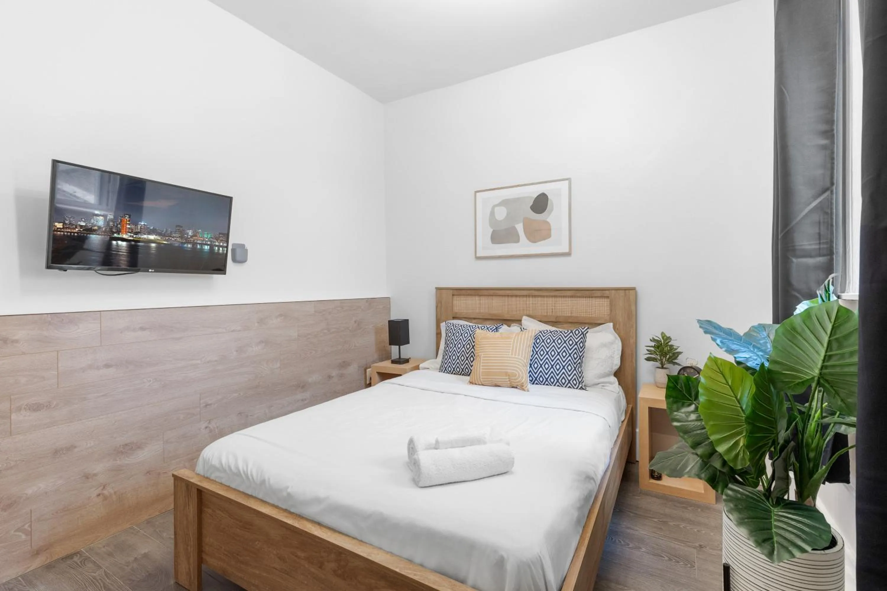 Bed in Le Sand & Stone Hotel