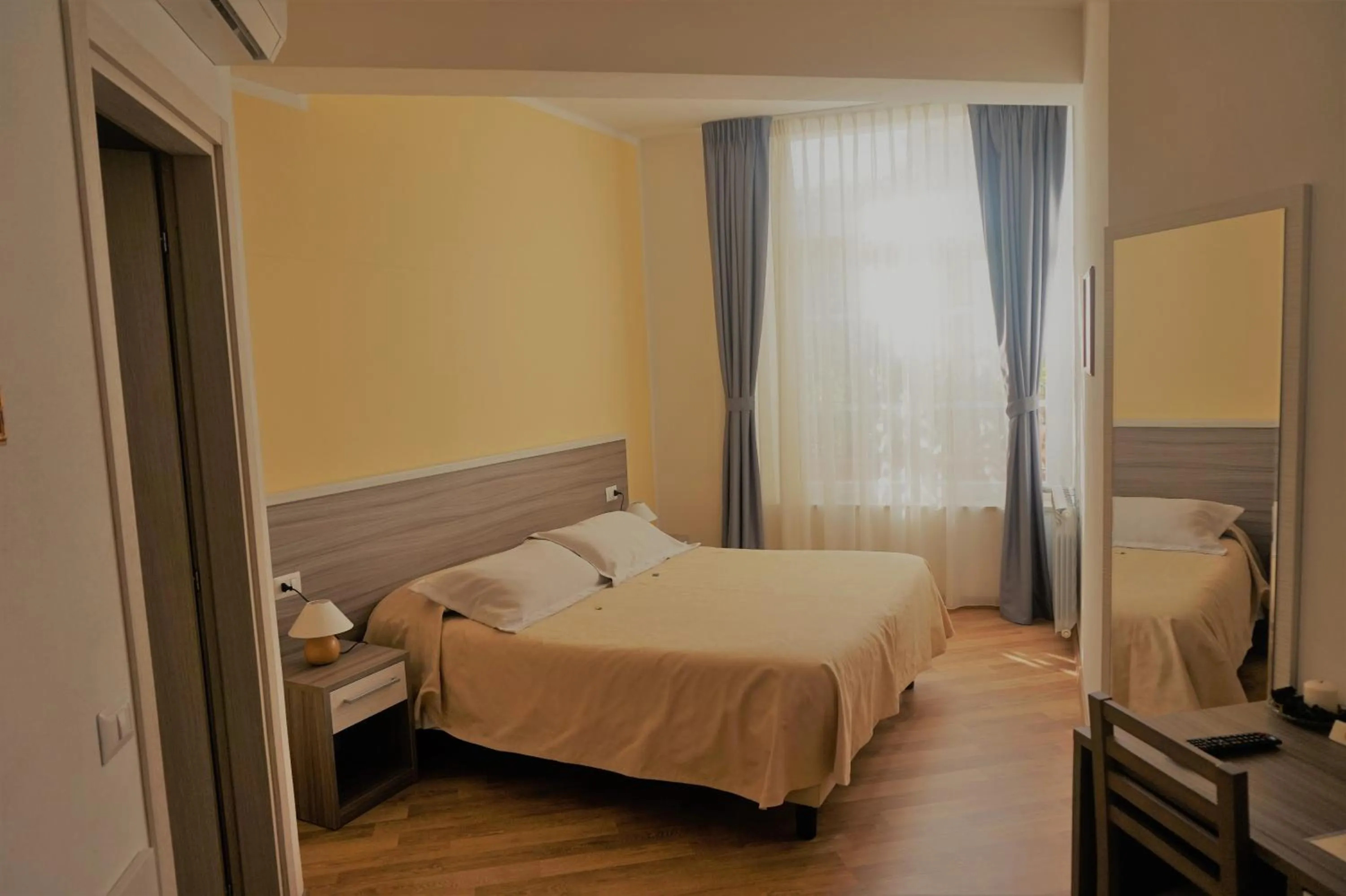 Bed in B&B I Tetti di Siena