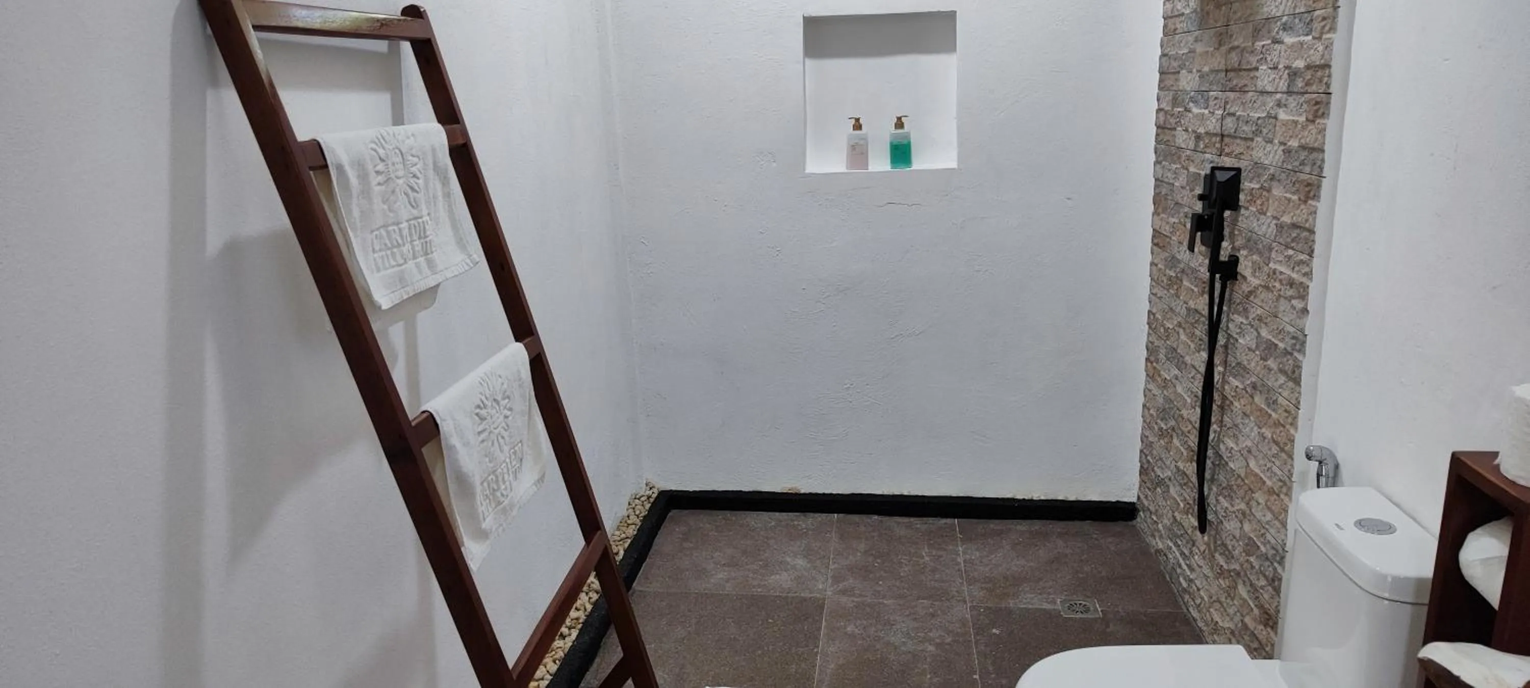 Toilet in Carpe Diem Villas & Resort