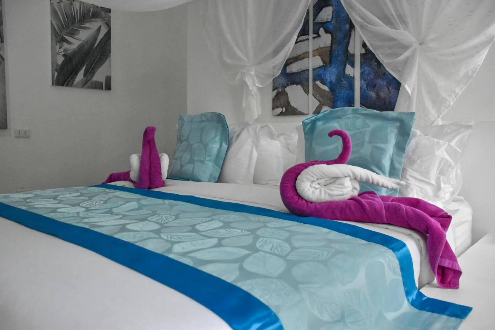 Bed in Carpe Diem Villas & Resort Dive & Stay resort