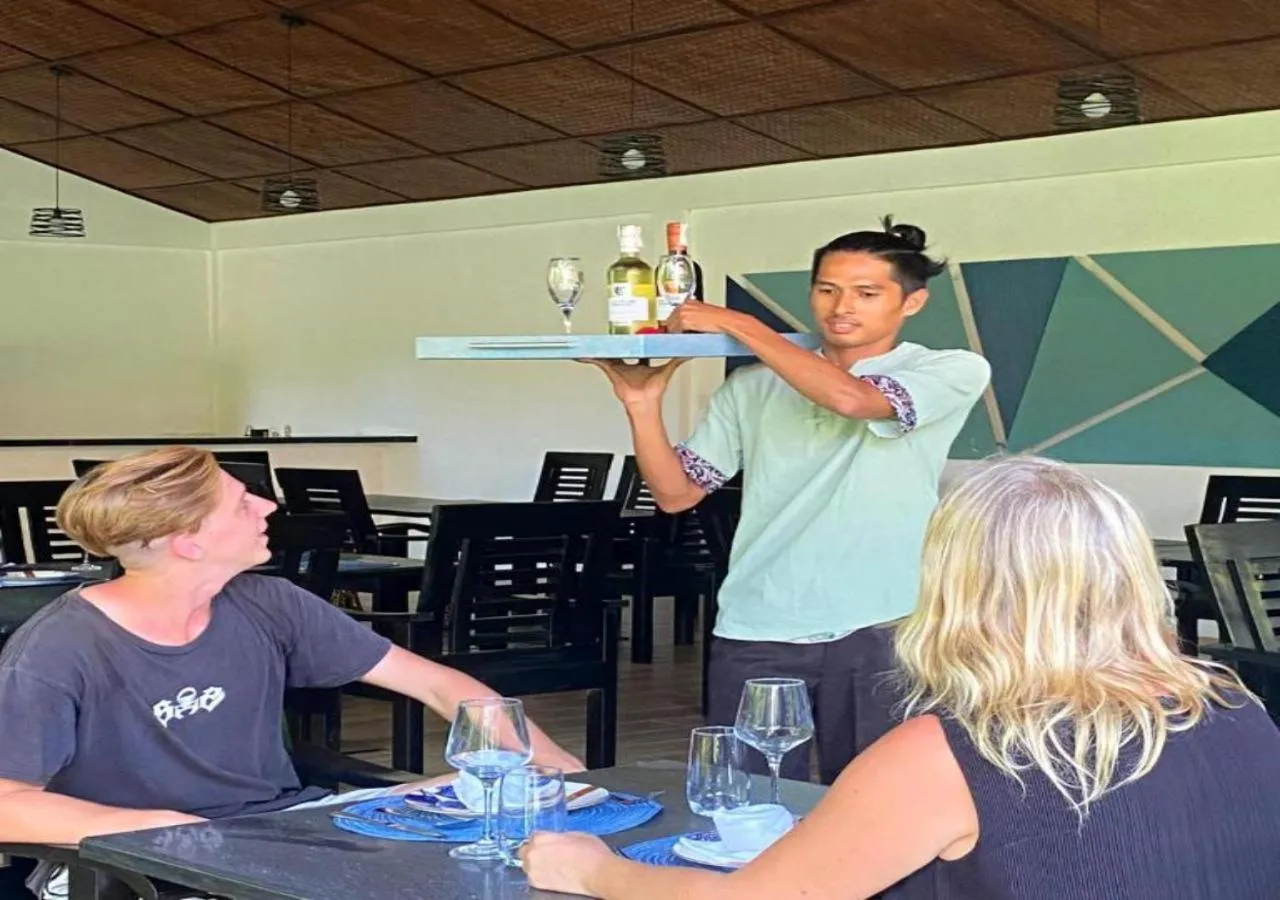 People in Carpe Diem Villas & Resort Dive & Stay resort