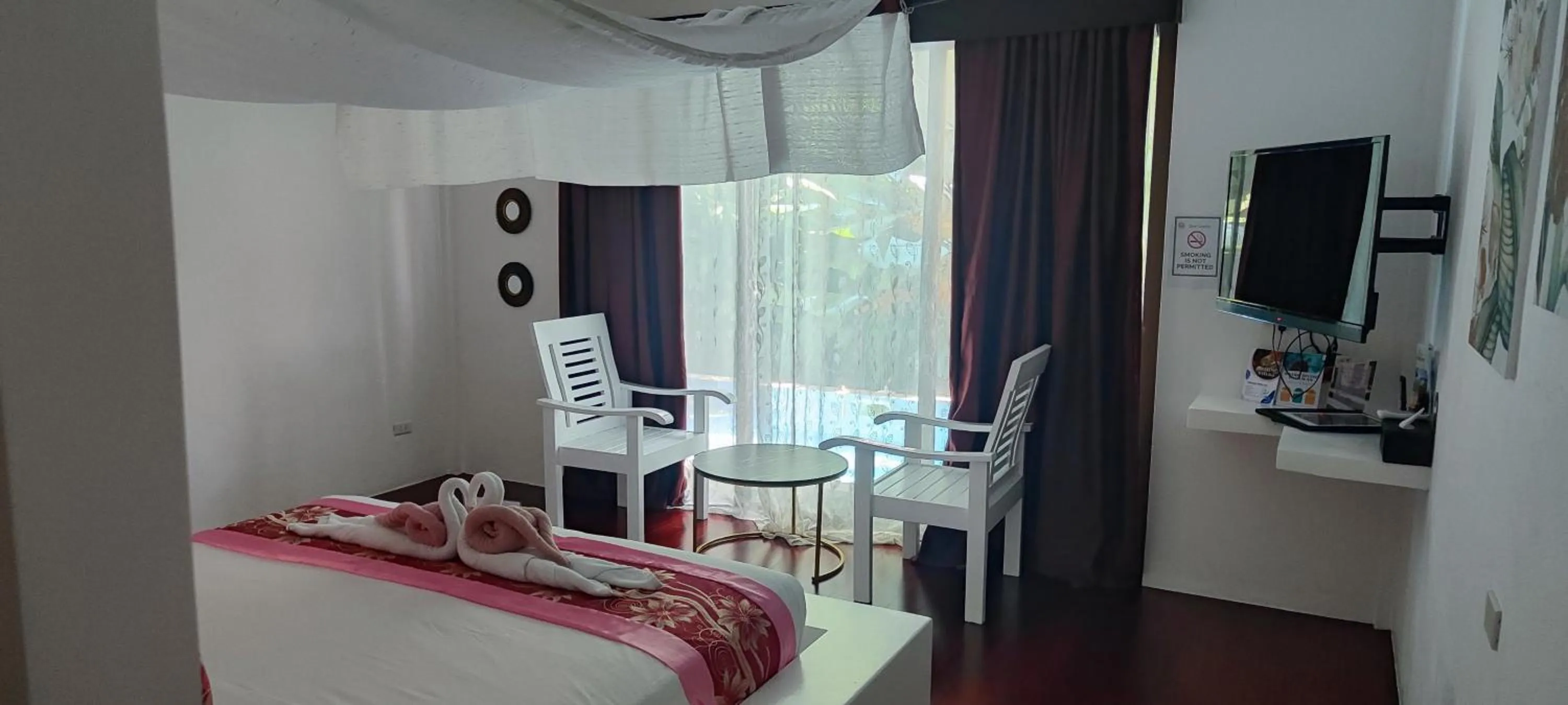 Property building, Bed in Carpe Diem Villas & Resort Dive & Stay resort