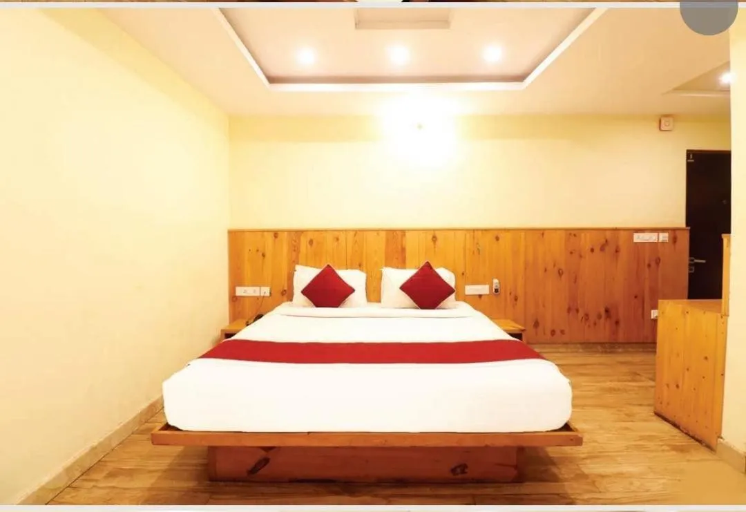 Bed in Hotel Royal Orbit