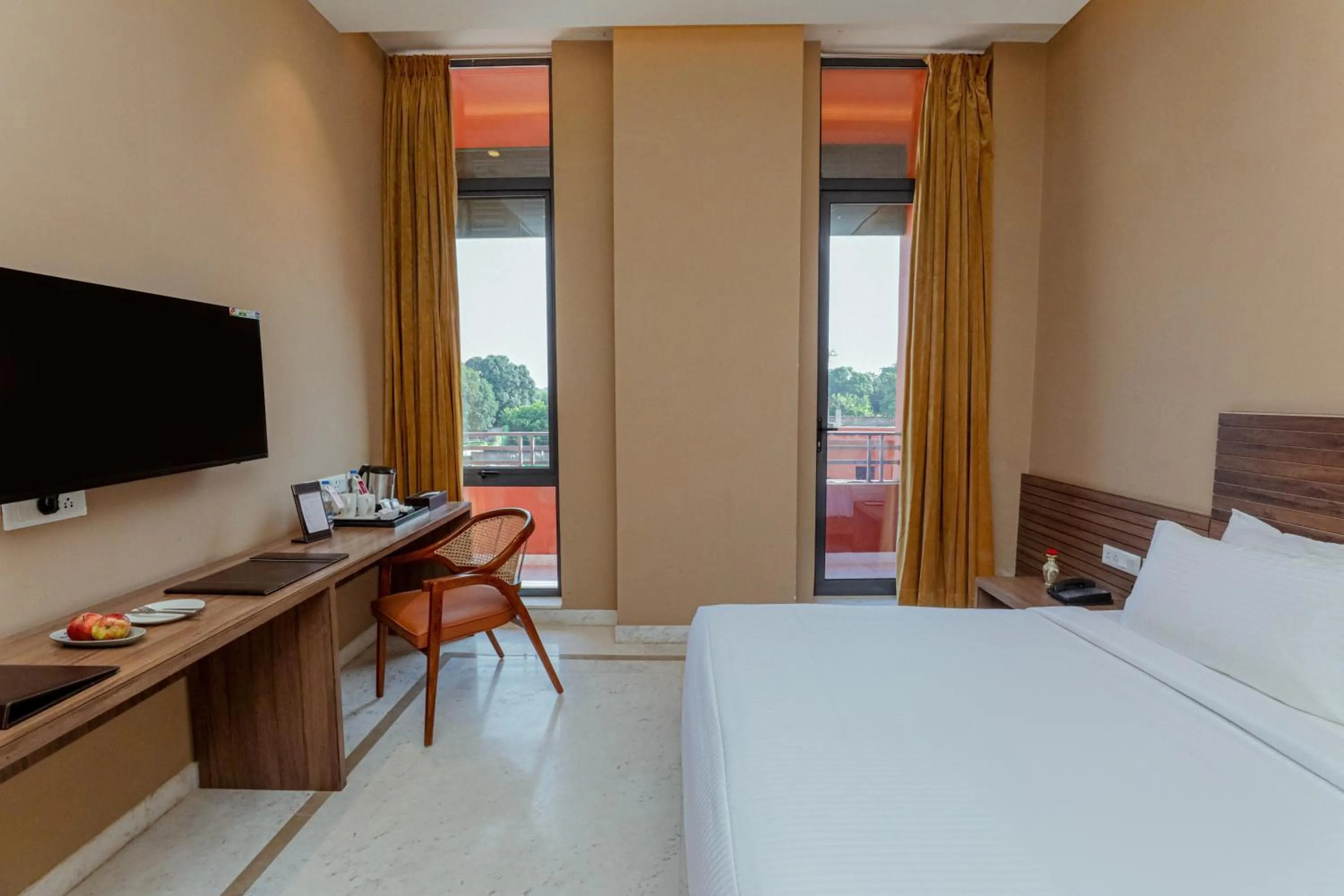 Bed in Gulab Kothi by Royal Orchid Hotels Limited Varanasi