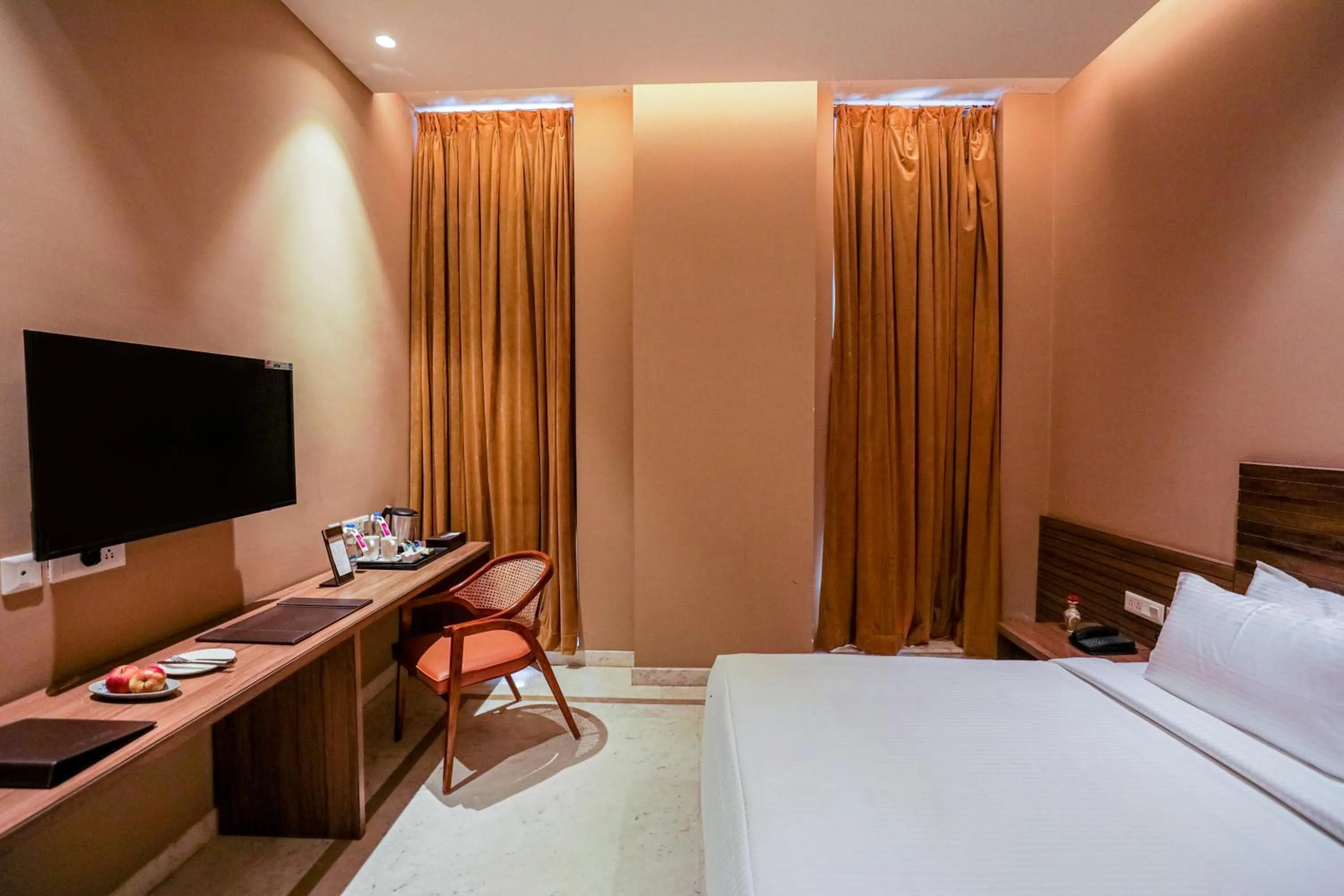 TV and multimedia, Bed in Gulab Kothi by Royal Orchid Hotels Limited Varanasi