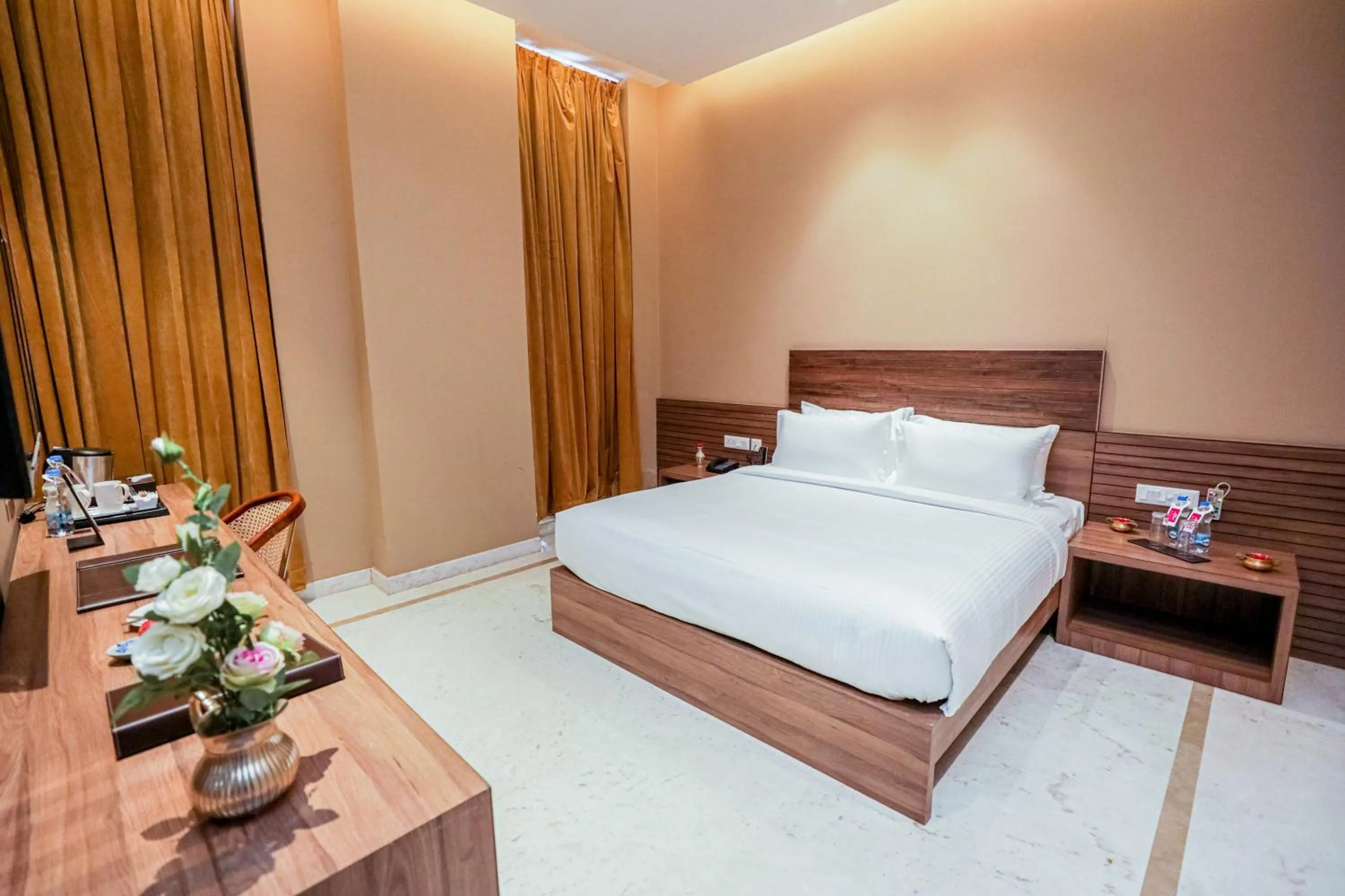 Bed in Gulab Kothi by Royal Orchid Hotels Limited Varanasi