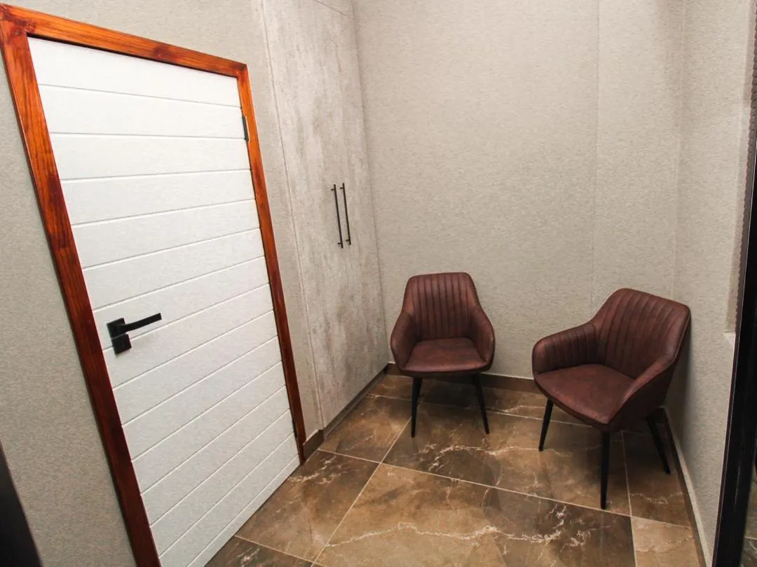 Seating area in @ 21 Guest House