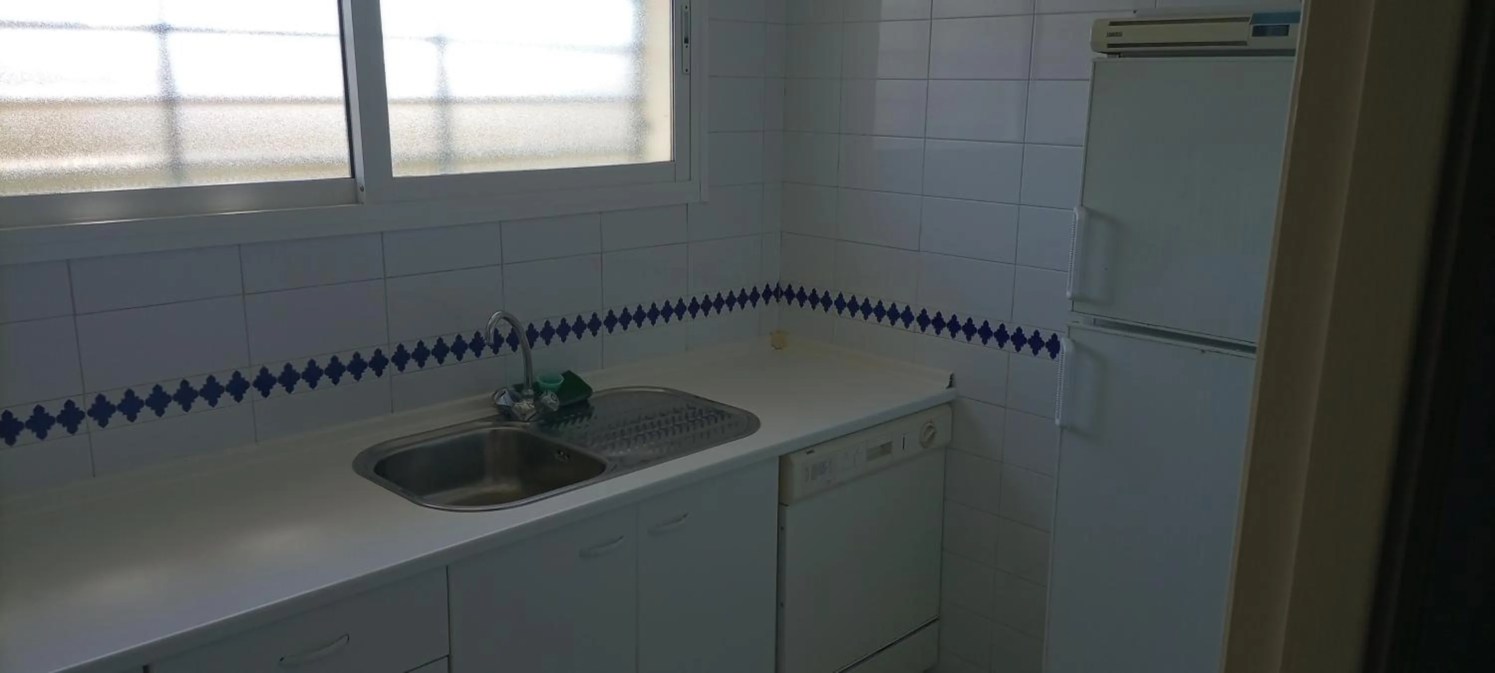 Kitchen or kitchenette in Hospedium Hotel Apartamentos Simón Verde