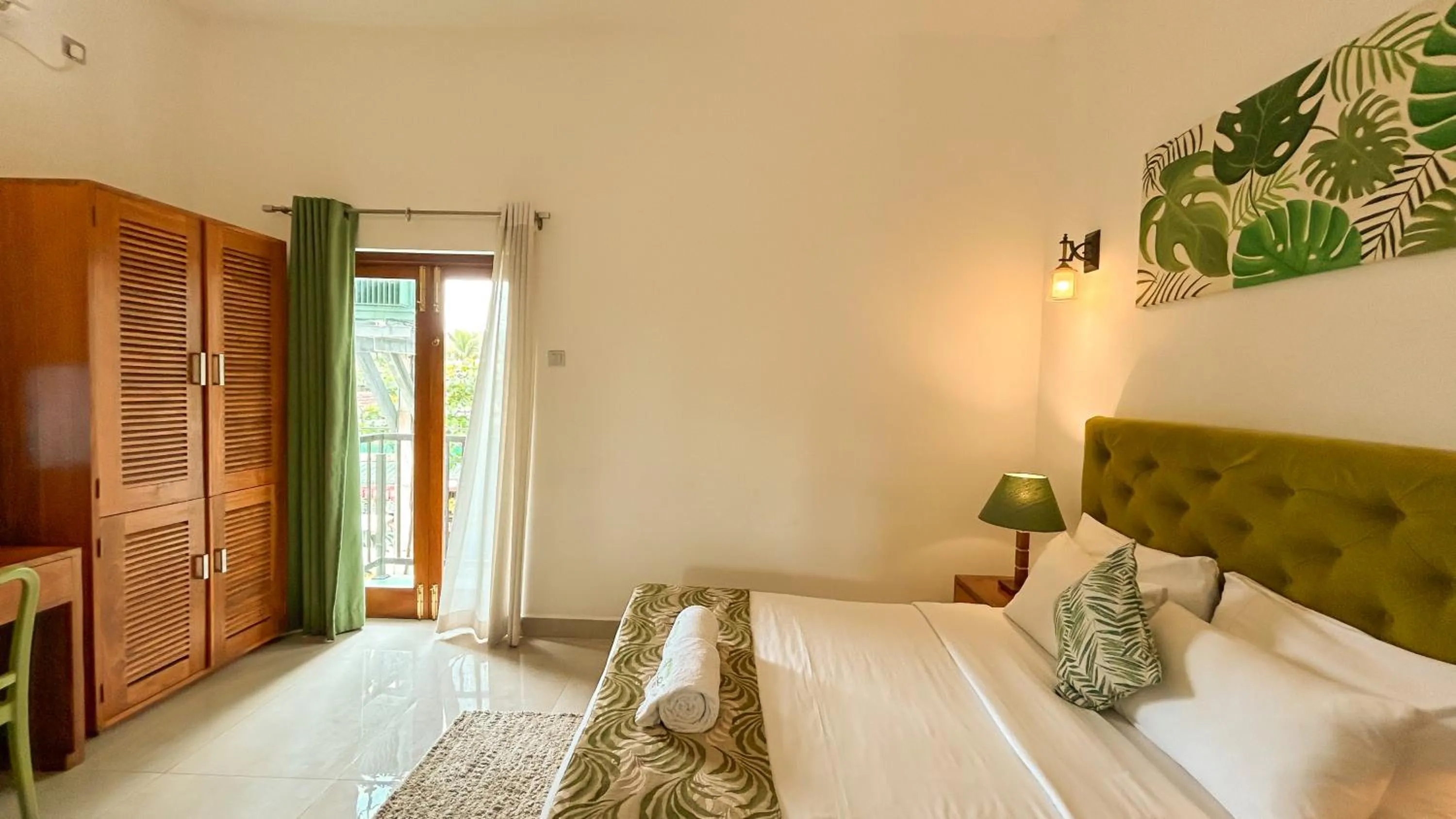 Bed in J leaf Hotel by Blue Bird