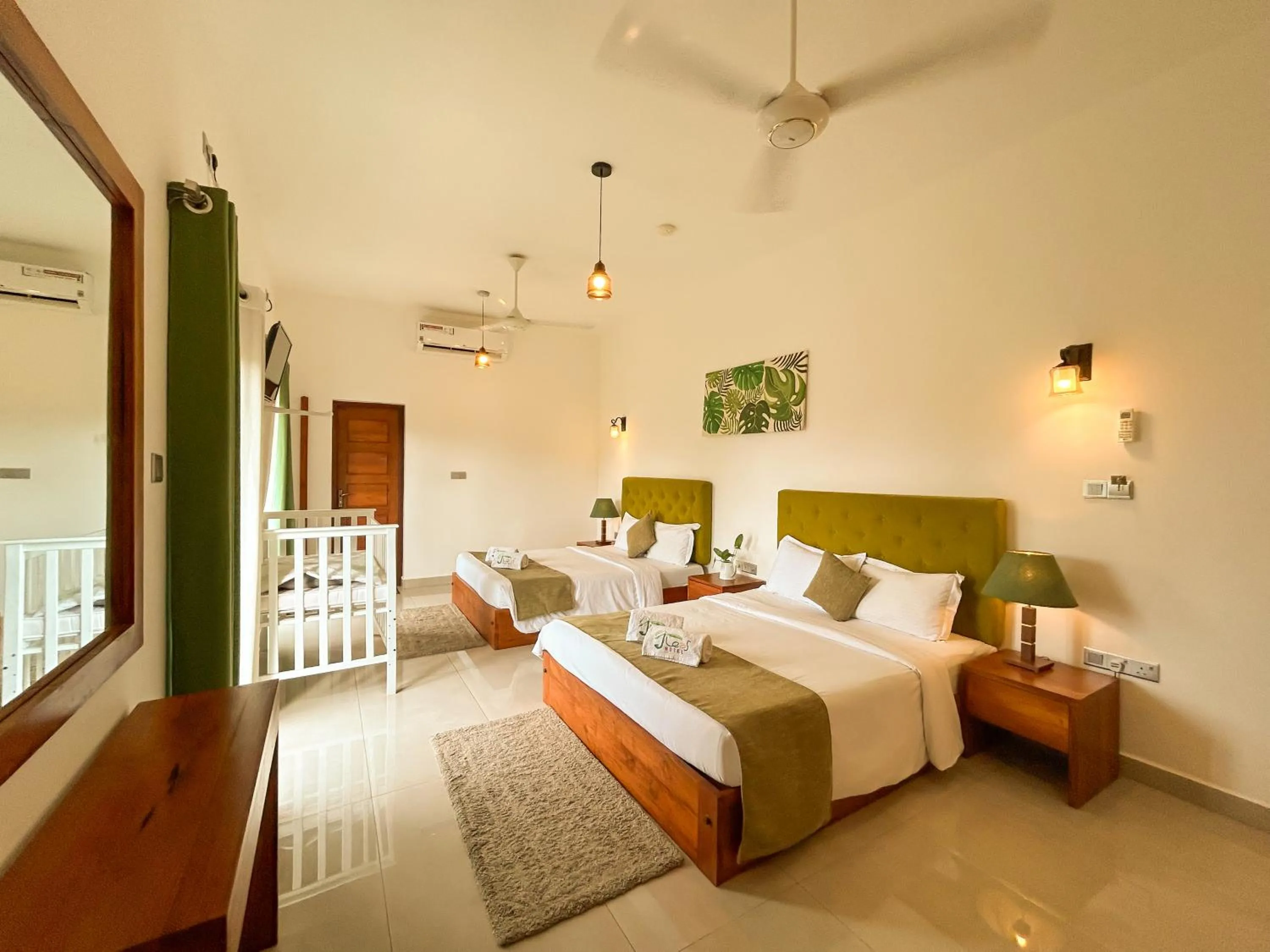 Bed in J leaf Hotel by Blue Bird