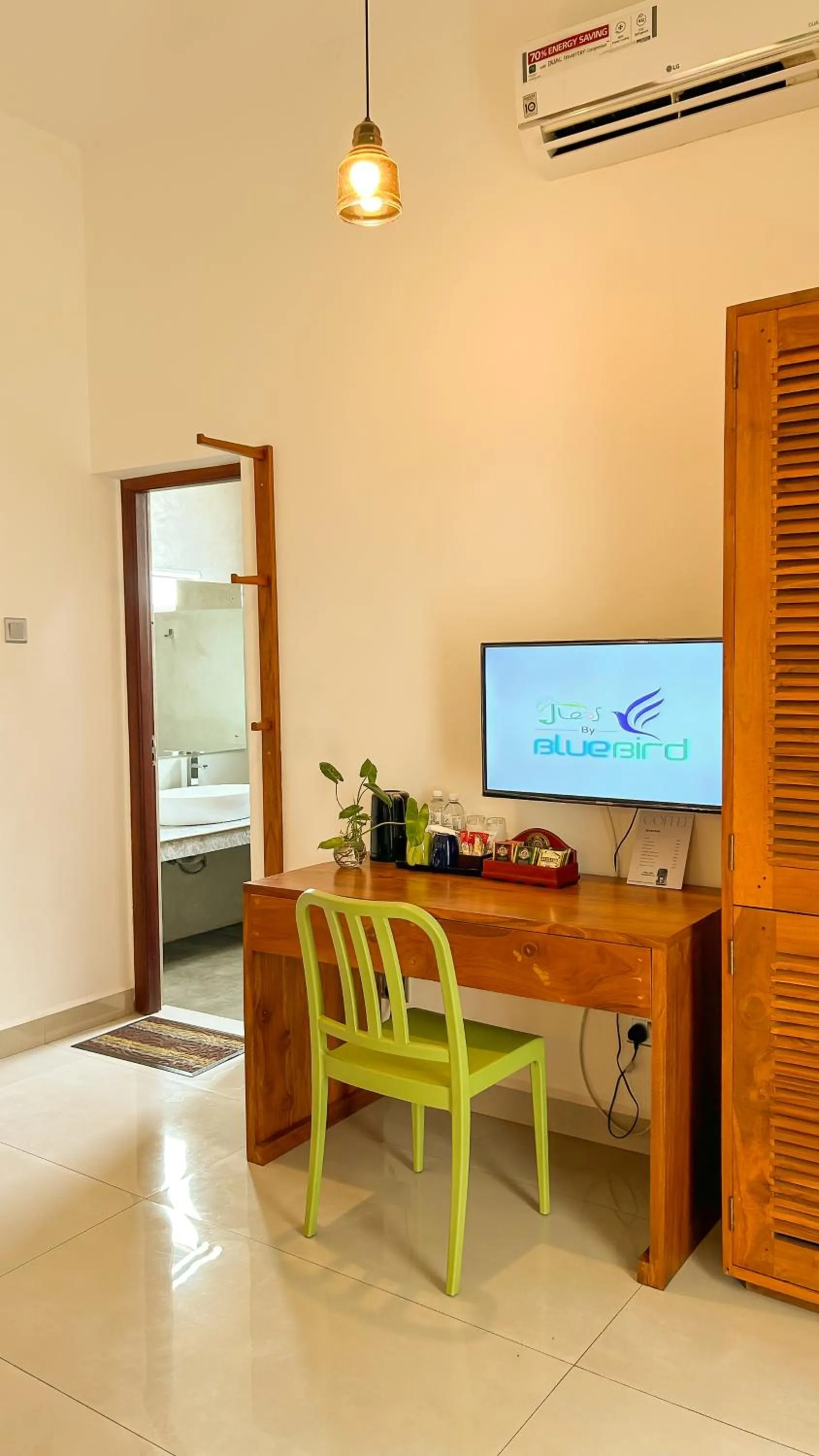 TV and multimedia in J leaf Hotel by Blue Bird