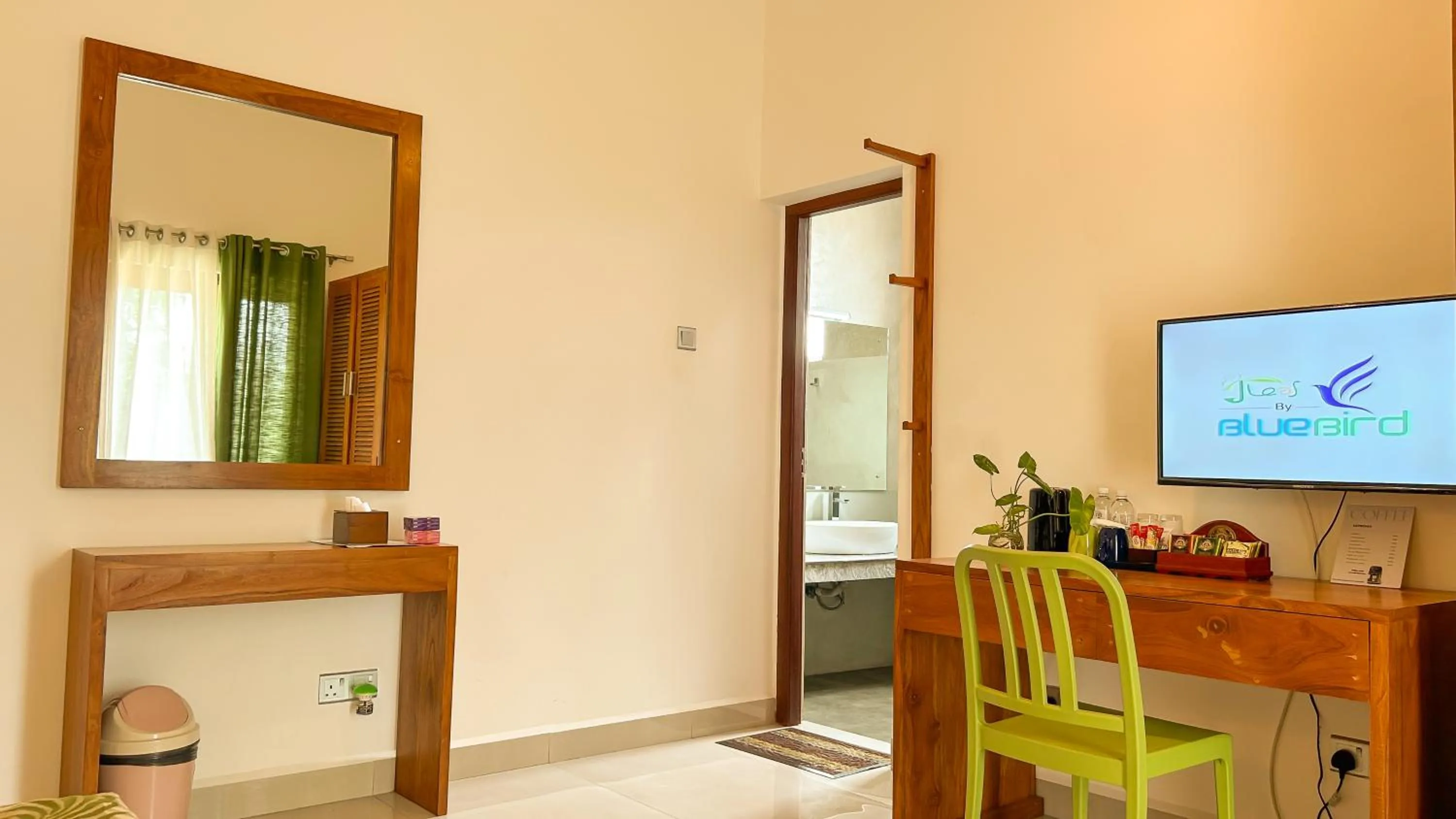 TV and multimedia in J leaf Hotel by Blue Bird