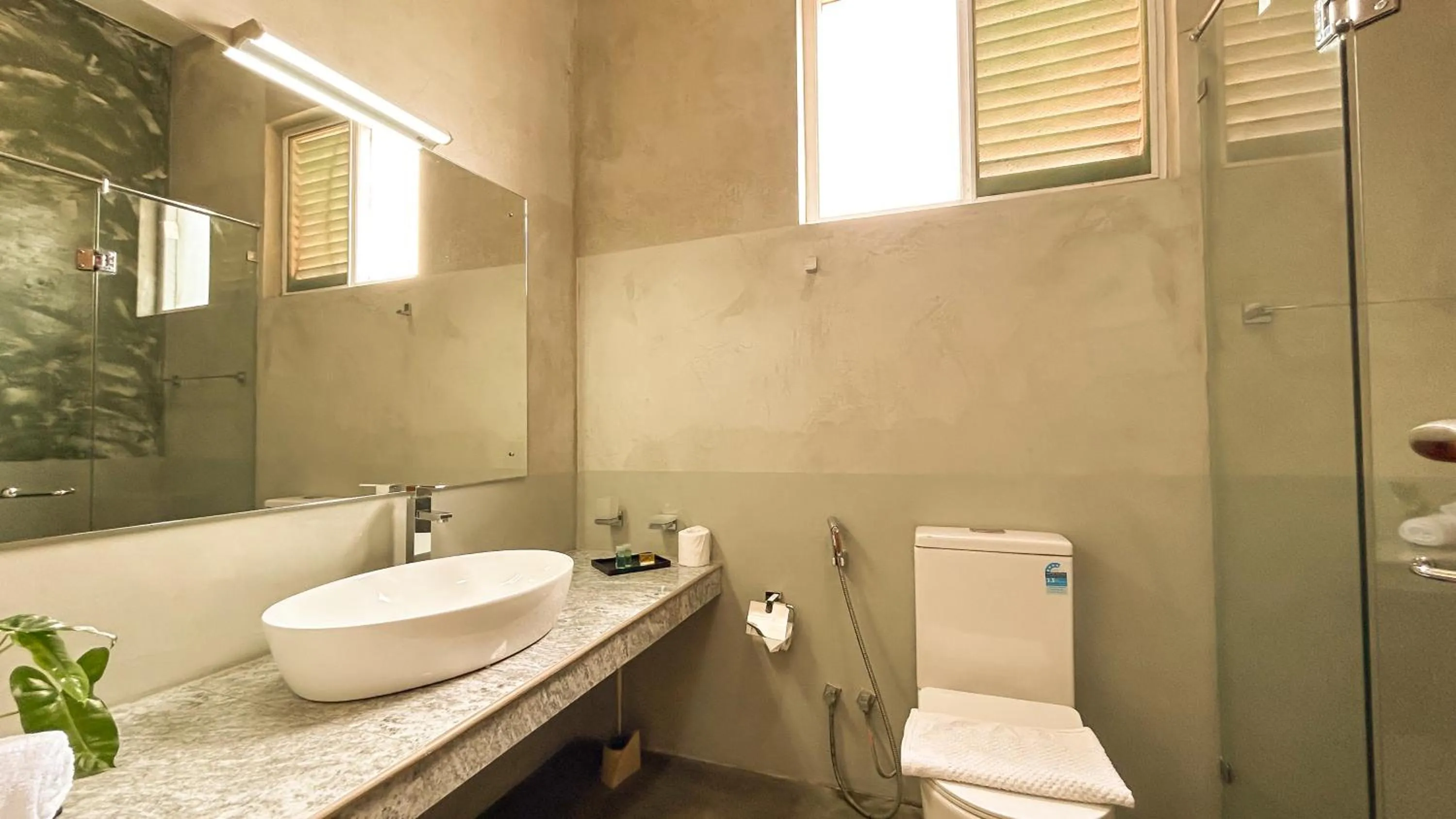 Shower in J leaf Hotel by Blue Bird