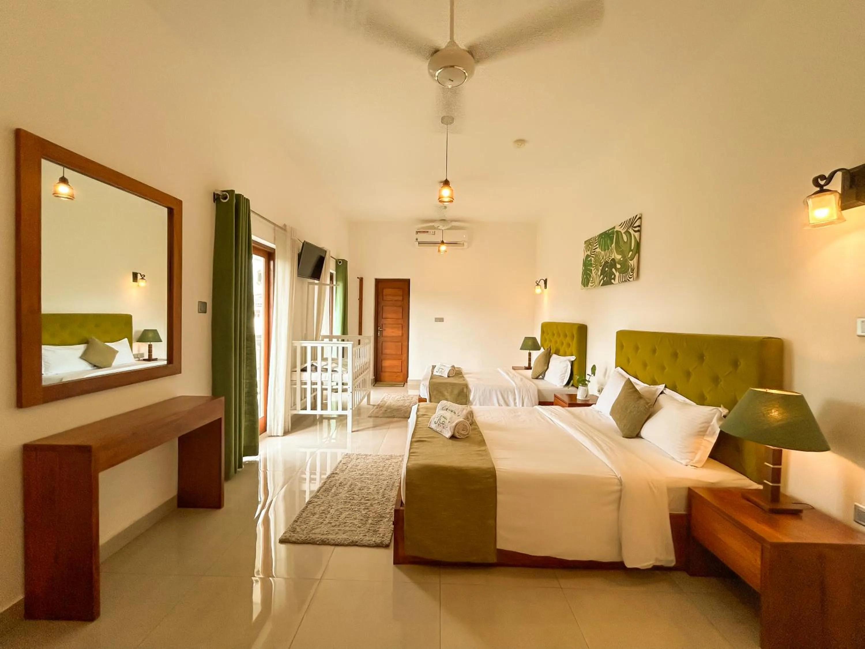 Bed in J leaf Hotel by Blue Bird