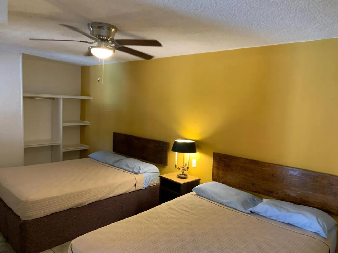 Bed in HOTEL MARIPINA