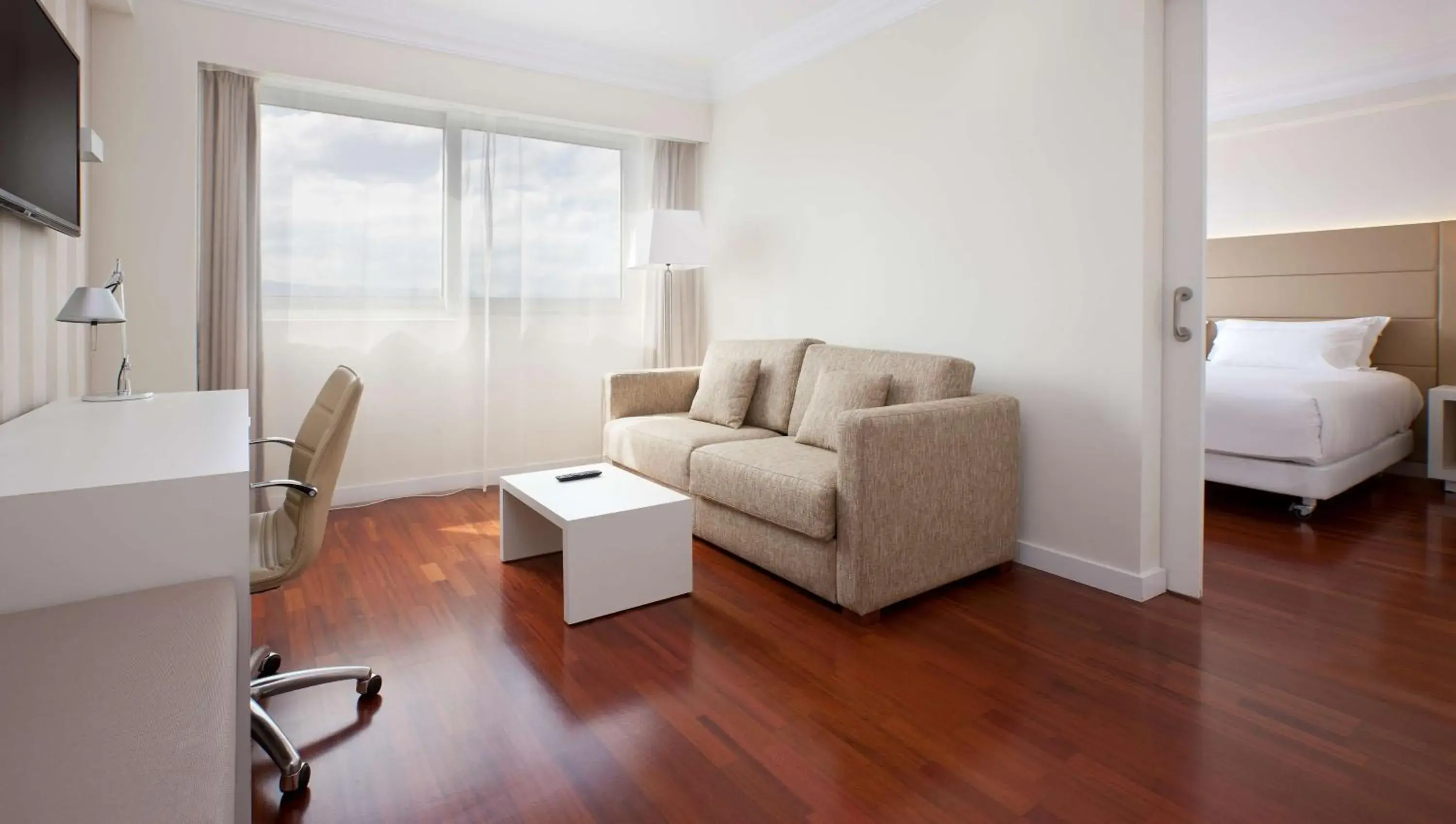 Family Triple Room in NH Pamplona Iruña Park Family Triple Room in NH Pamplona Iruña Park