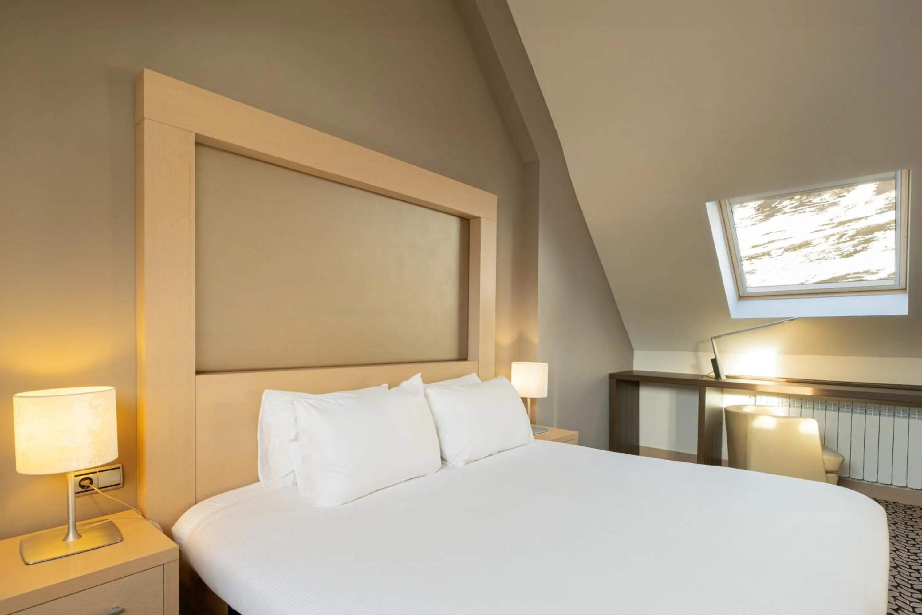 Bed in Eurostars Royal Tanau