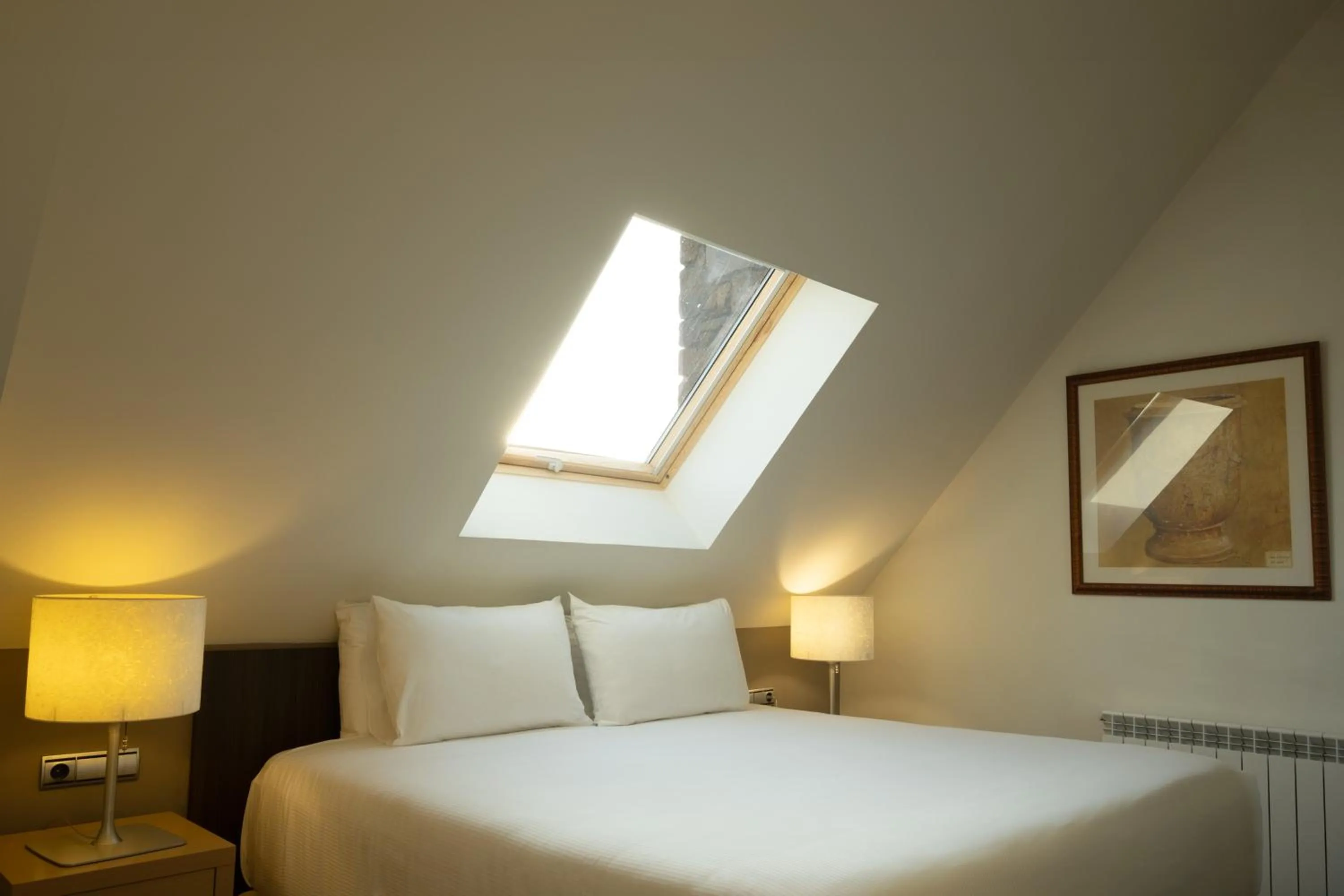 Bed in Eurostars Royal Tanau