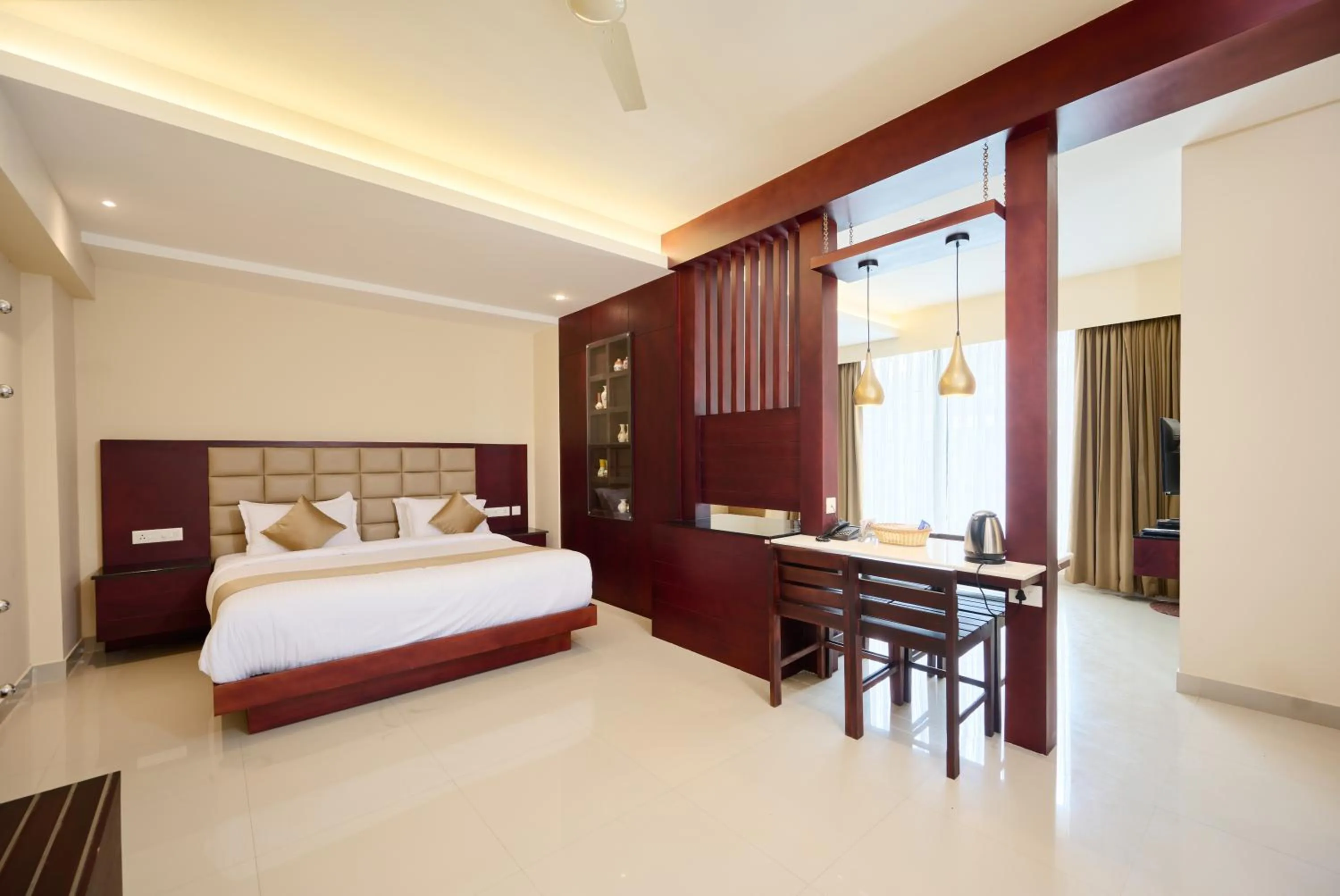 Photo of the whole room, Bed in Thekkady Gavi Suites