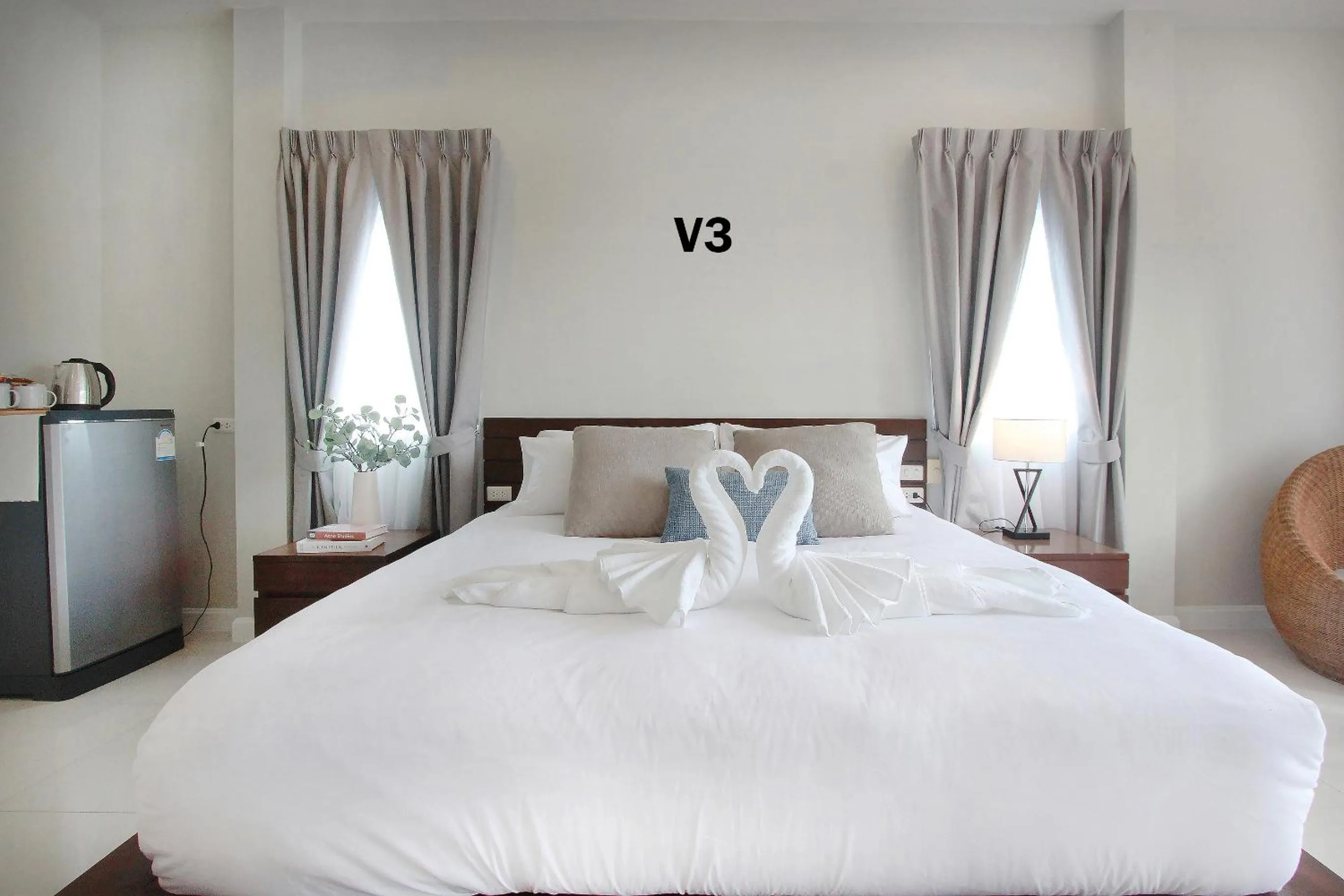 Bed in The Langstan Suites