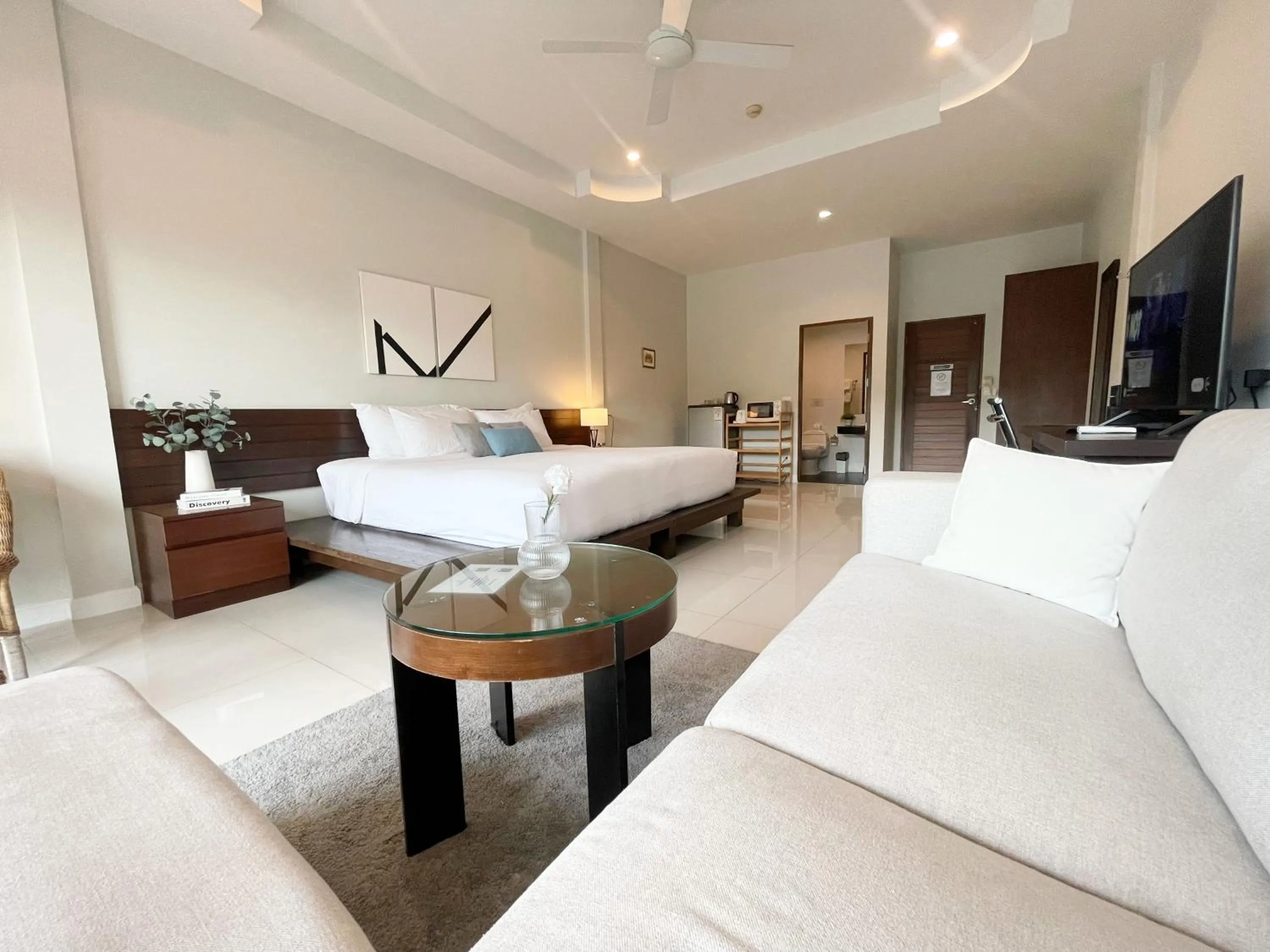 Bed in The Langstan Suites