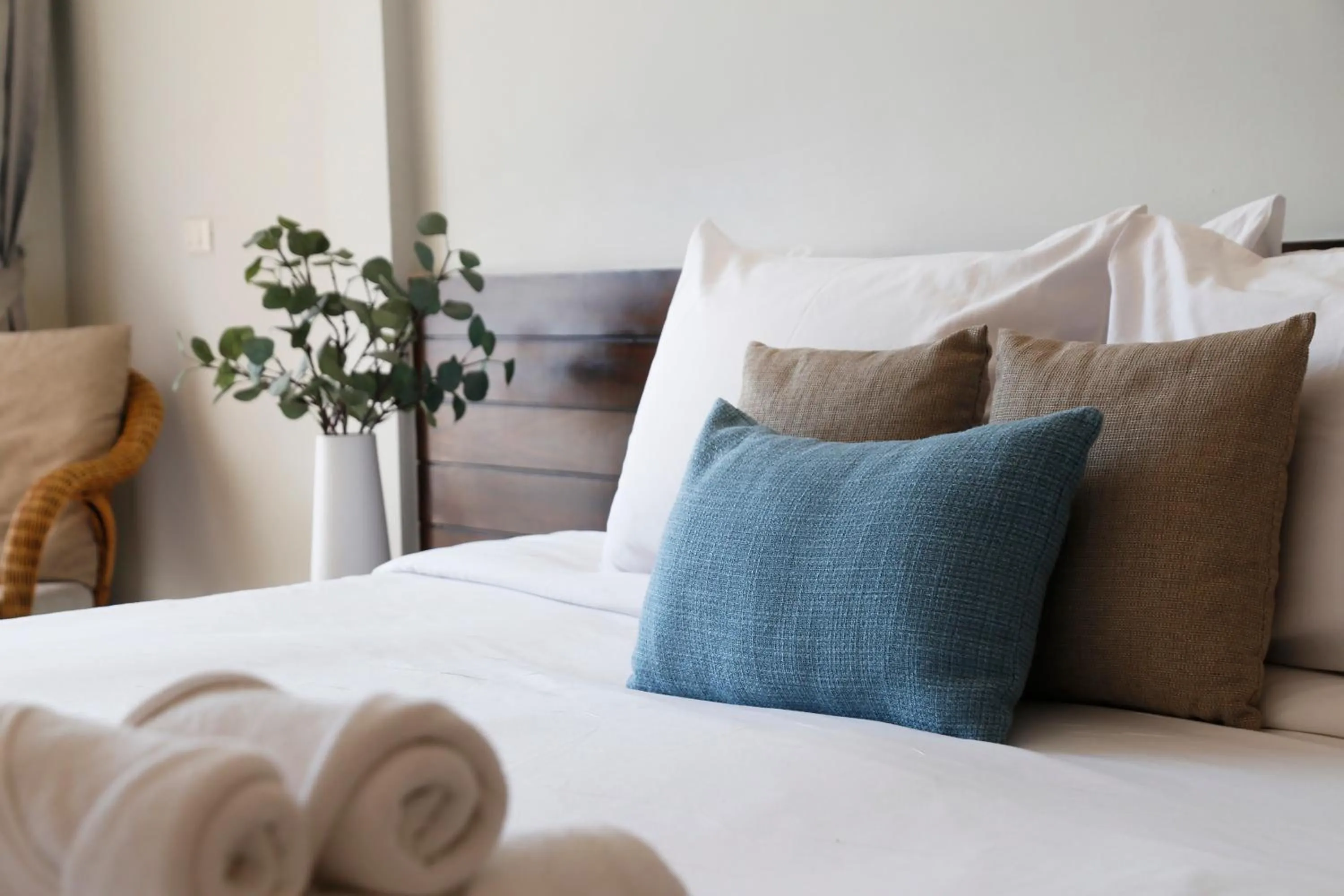 Bed in The Langstan Suites