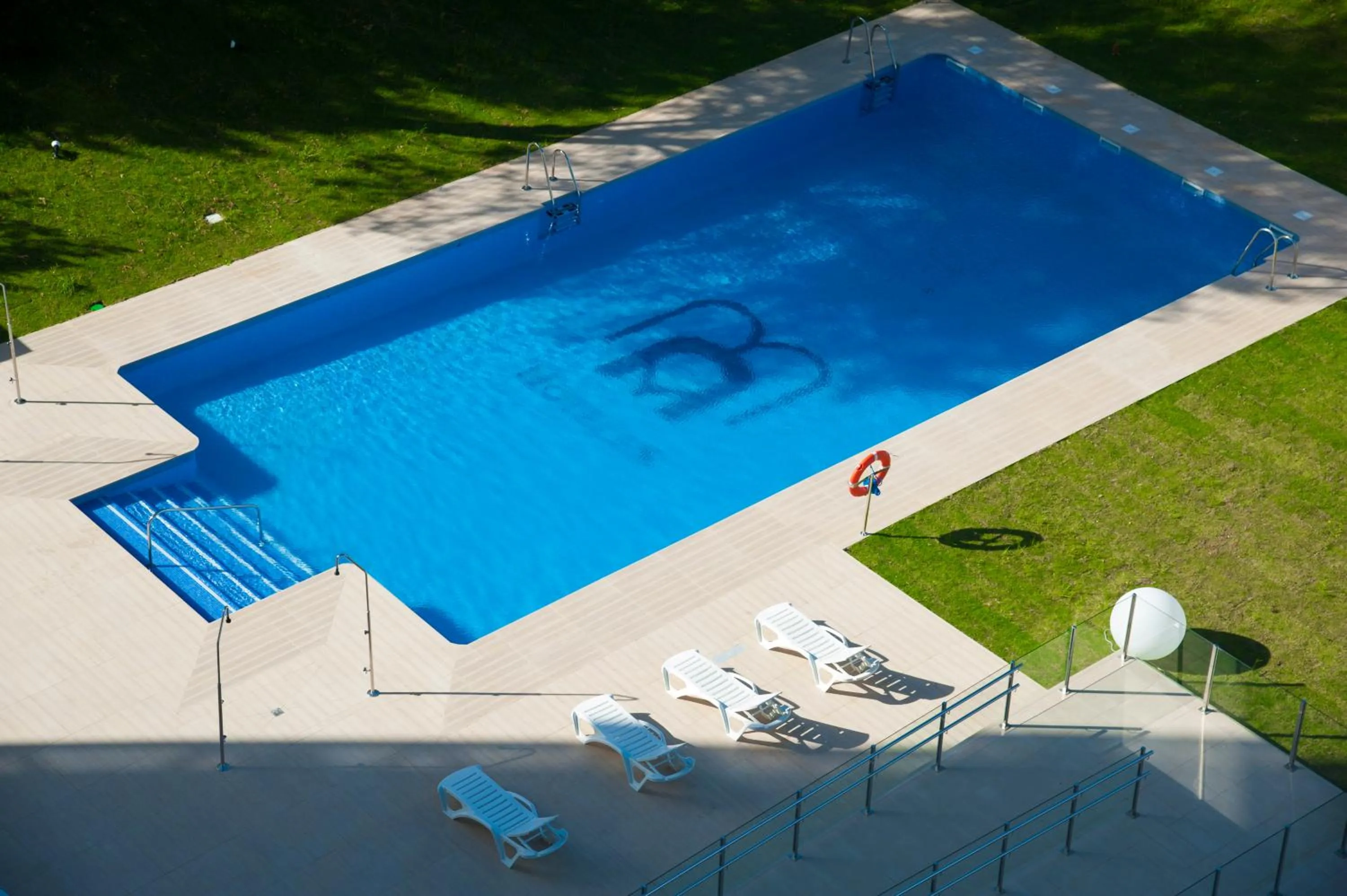 Swimming pool in M.A. Hotel Sevilla Congresos