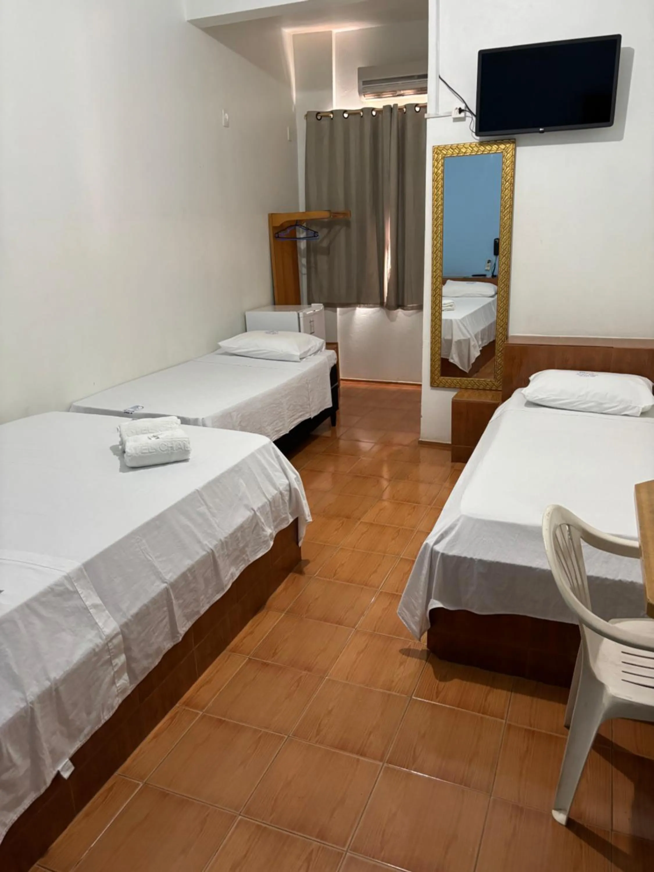 Bed in Hotel Chalé Ji-Parana