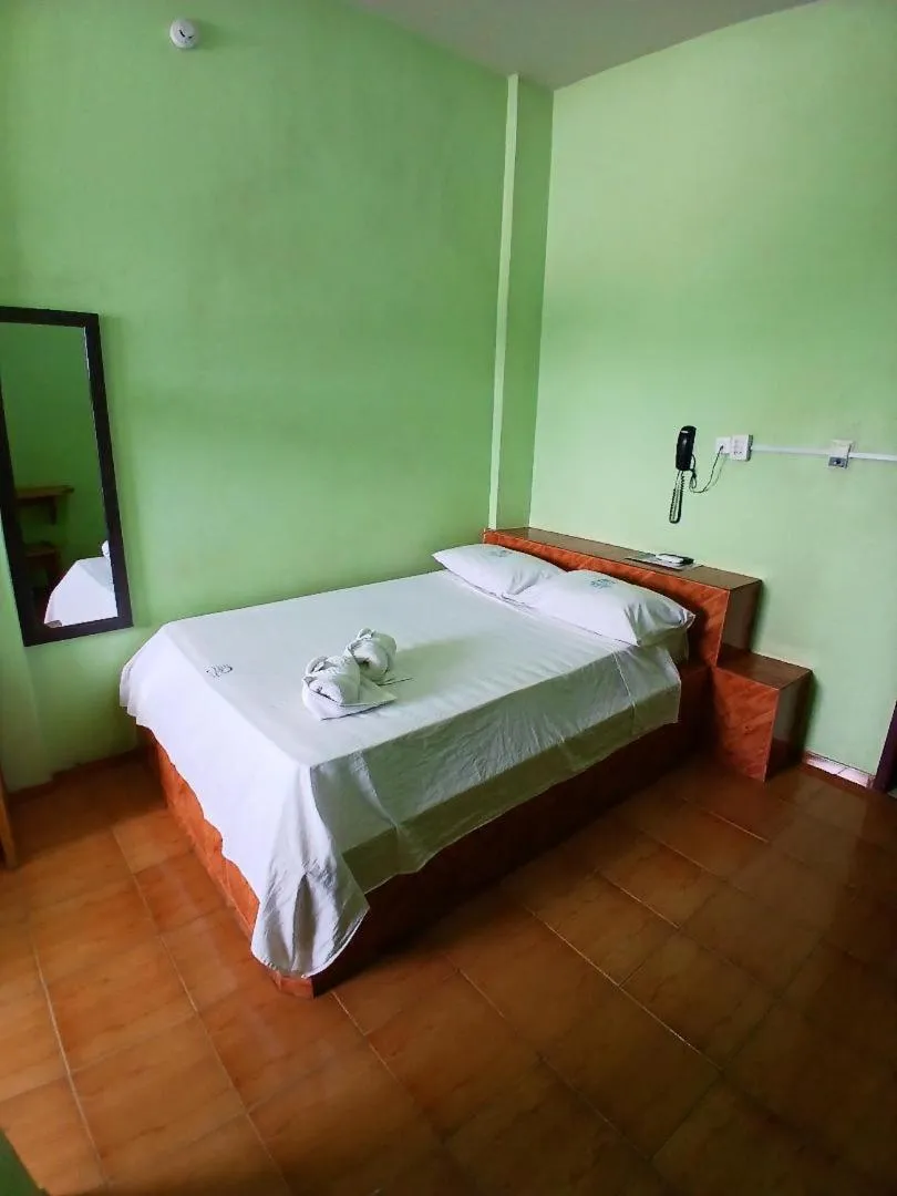 Bed in Hotel Chalé Ji-Parana