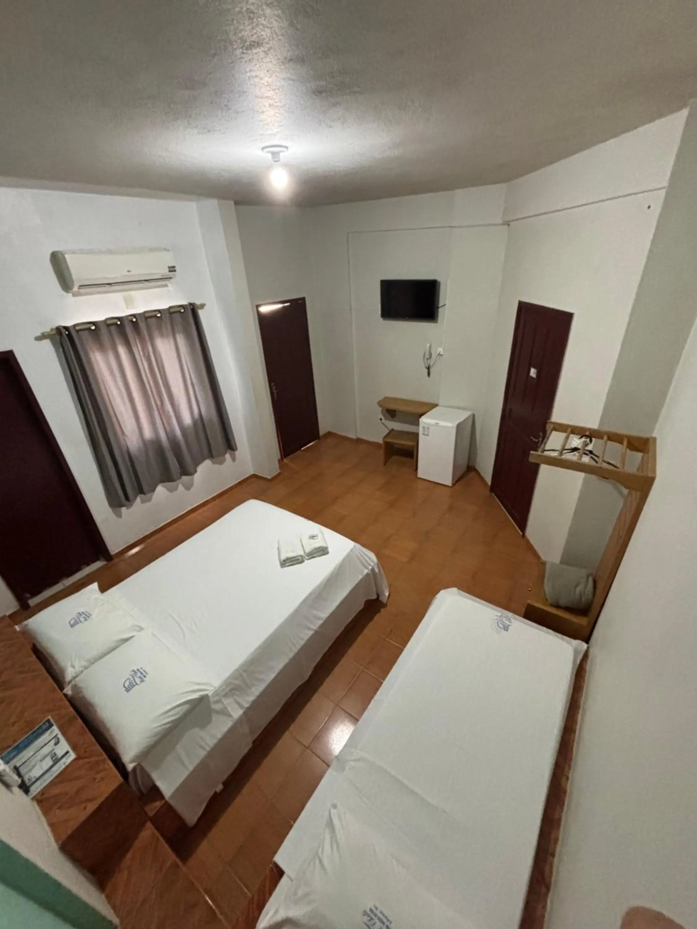 Bed in Hotel Chalé Ji-Parana