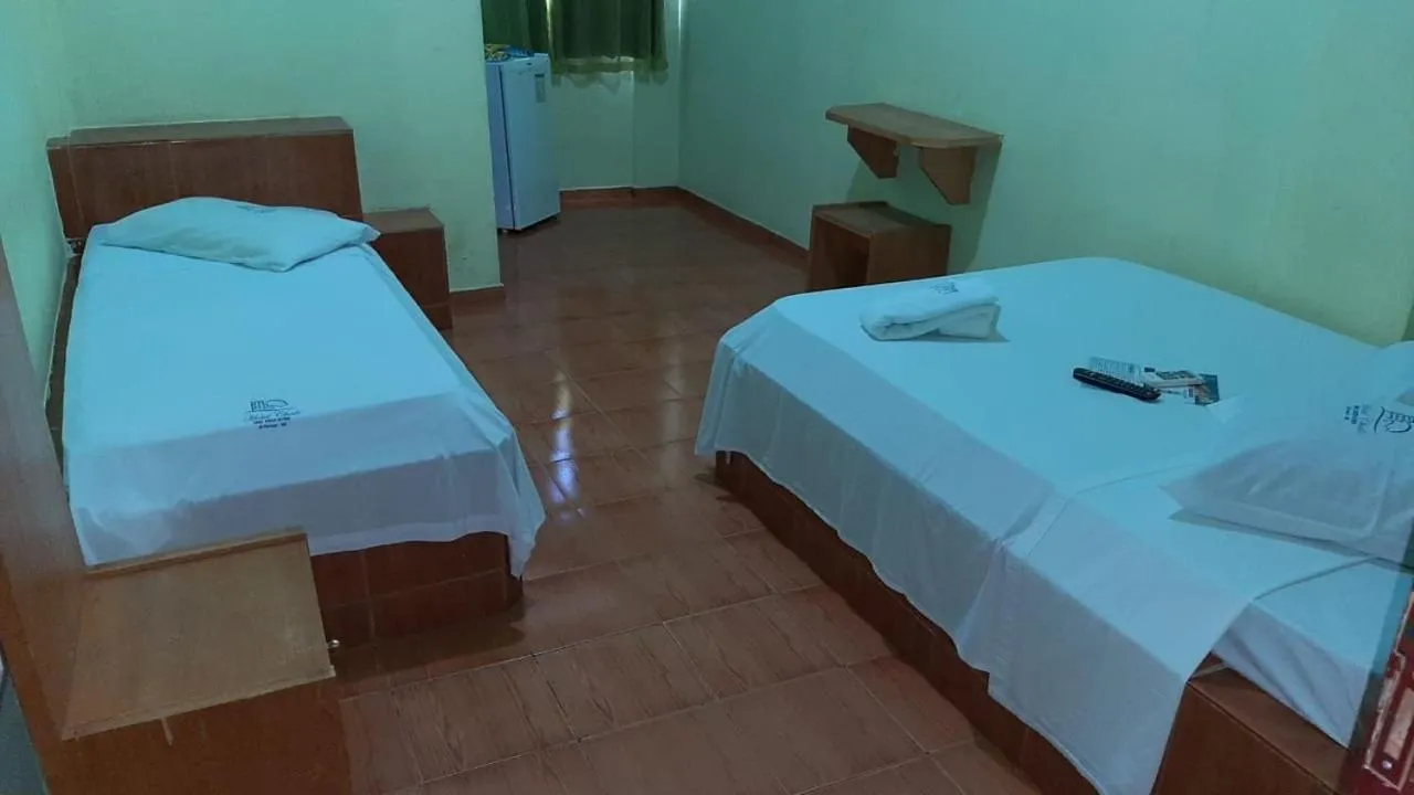 Bed in Hotel Chalé Ji-Parana
