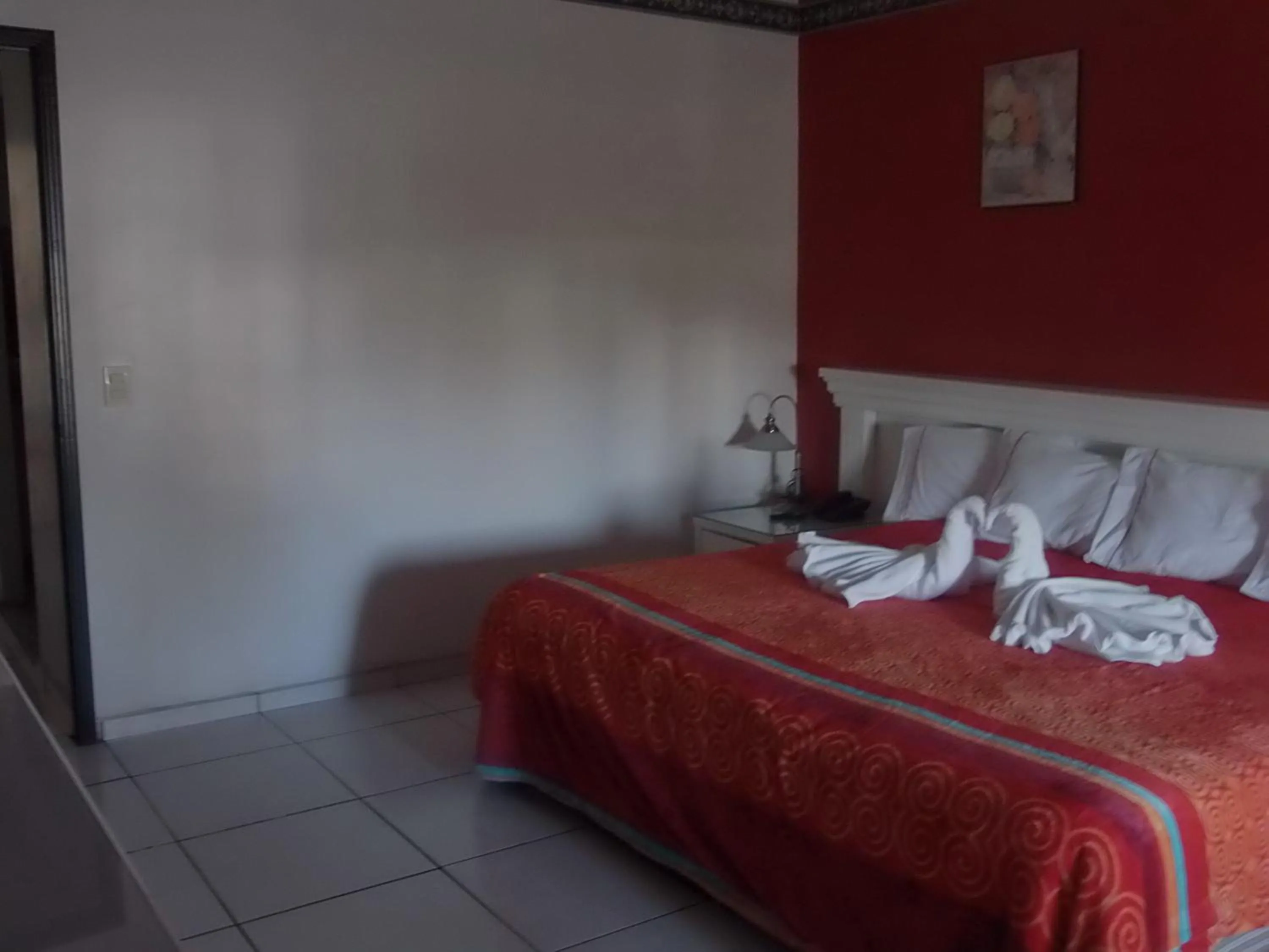 Bedroom in Hotel Raldos Inn