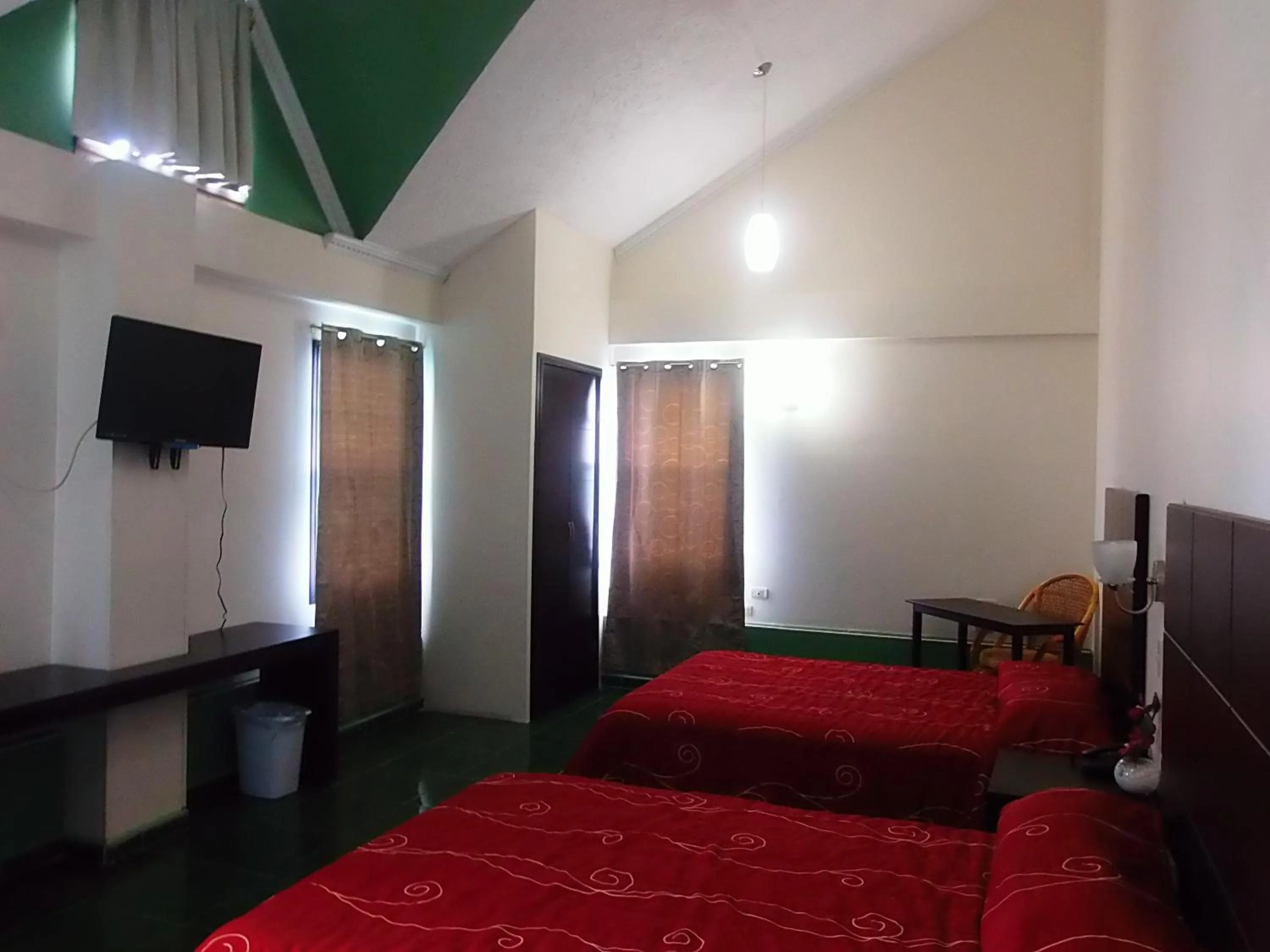 Bedroom in Hotel Raldos Inn