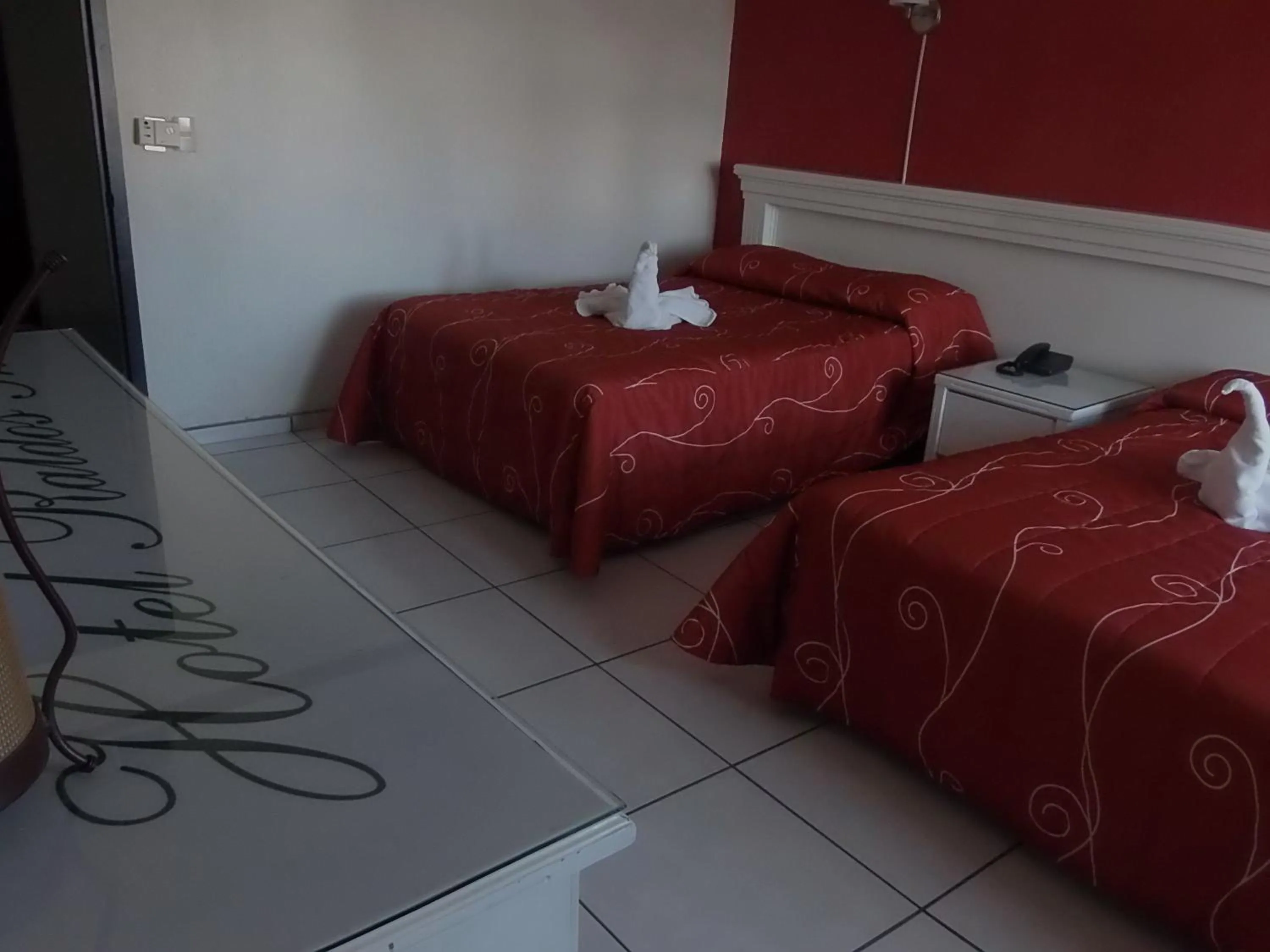 Bedroom in Hotel Raldos Inn