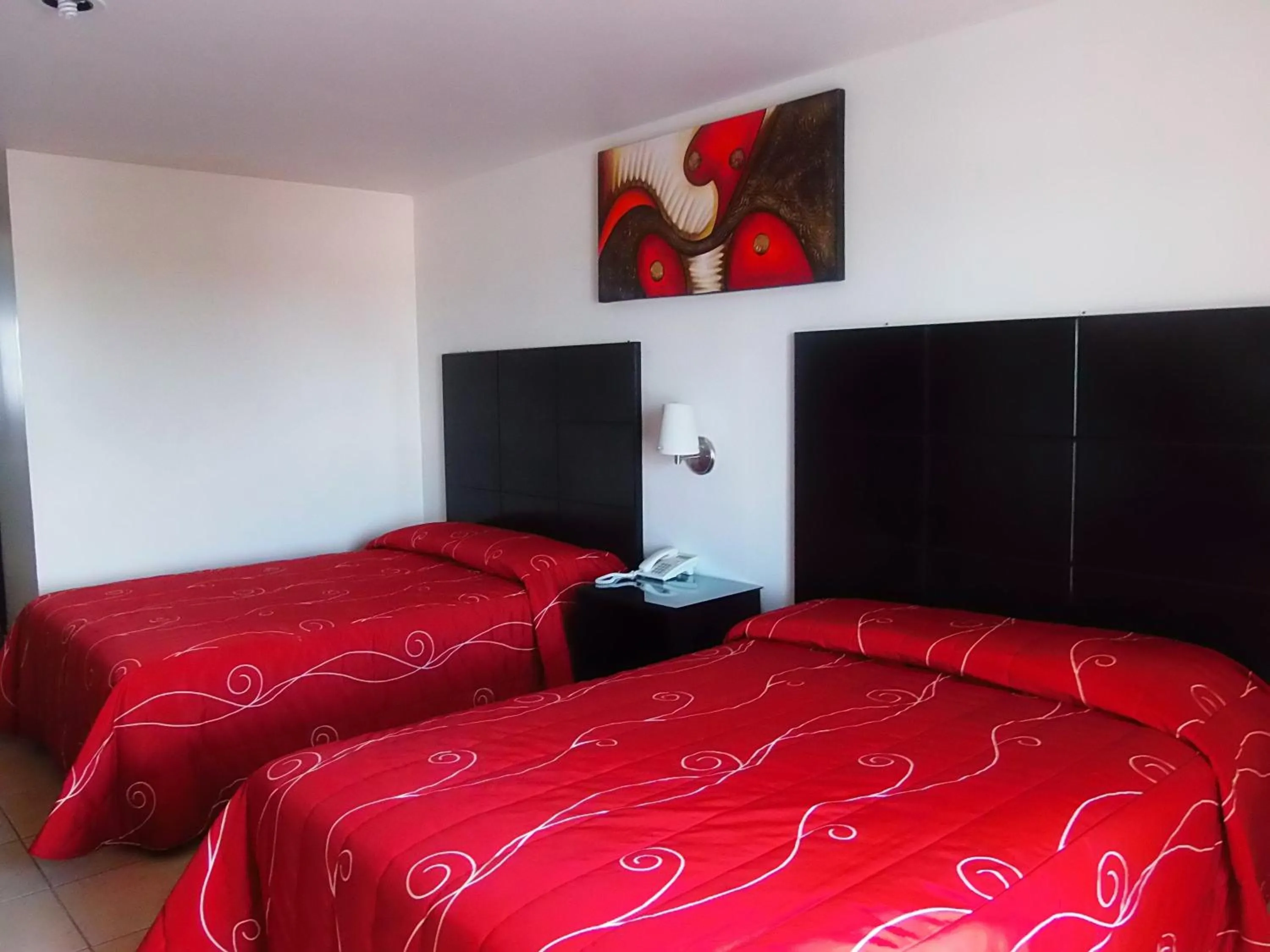 Bedroom in Hotel Raldos Inn